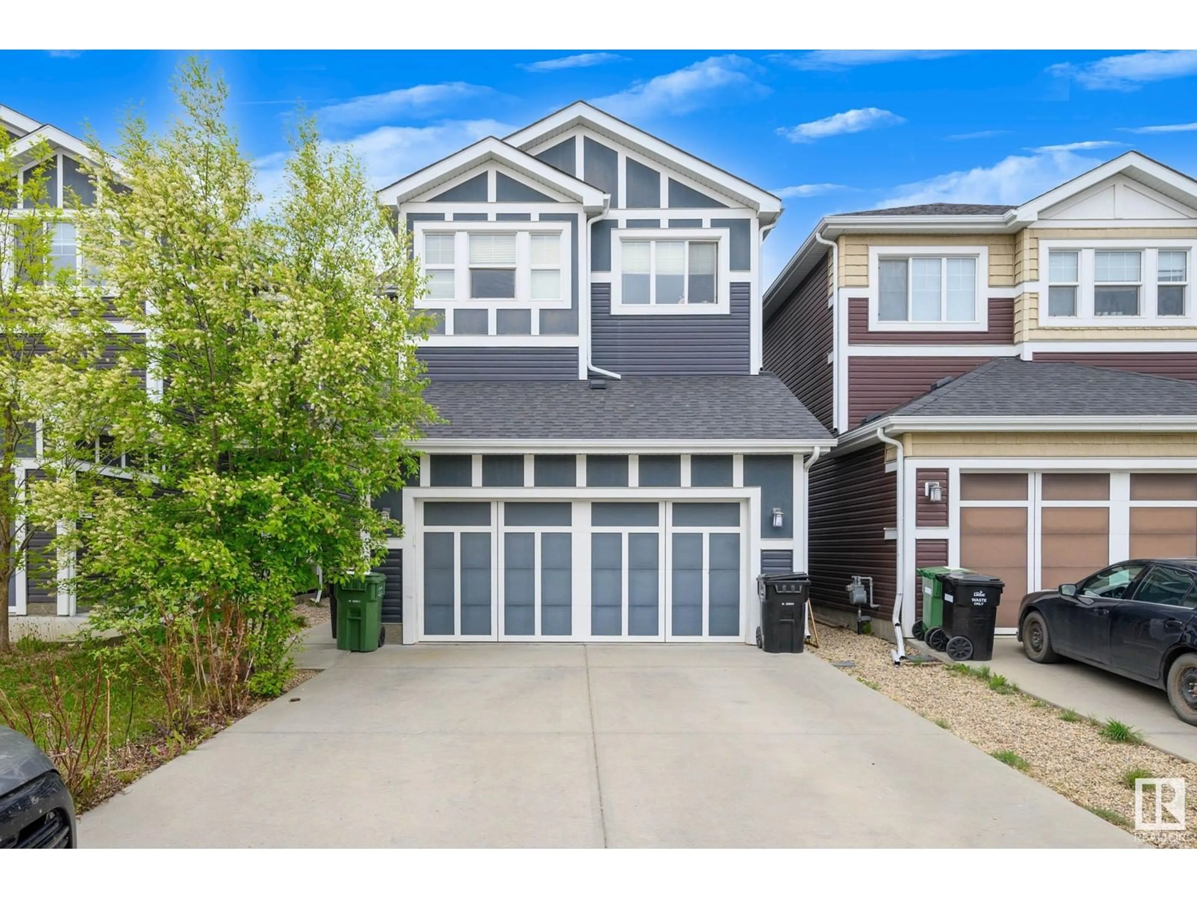Home with vinyl exterior material, street for 424 SIMPKINS LI, Leduc Alberta T9E1B3