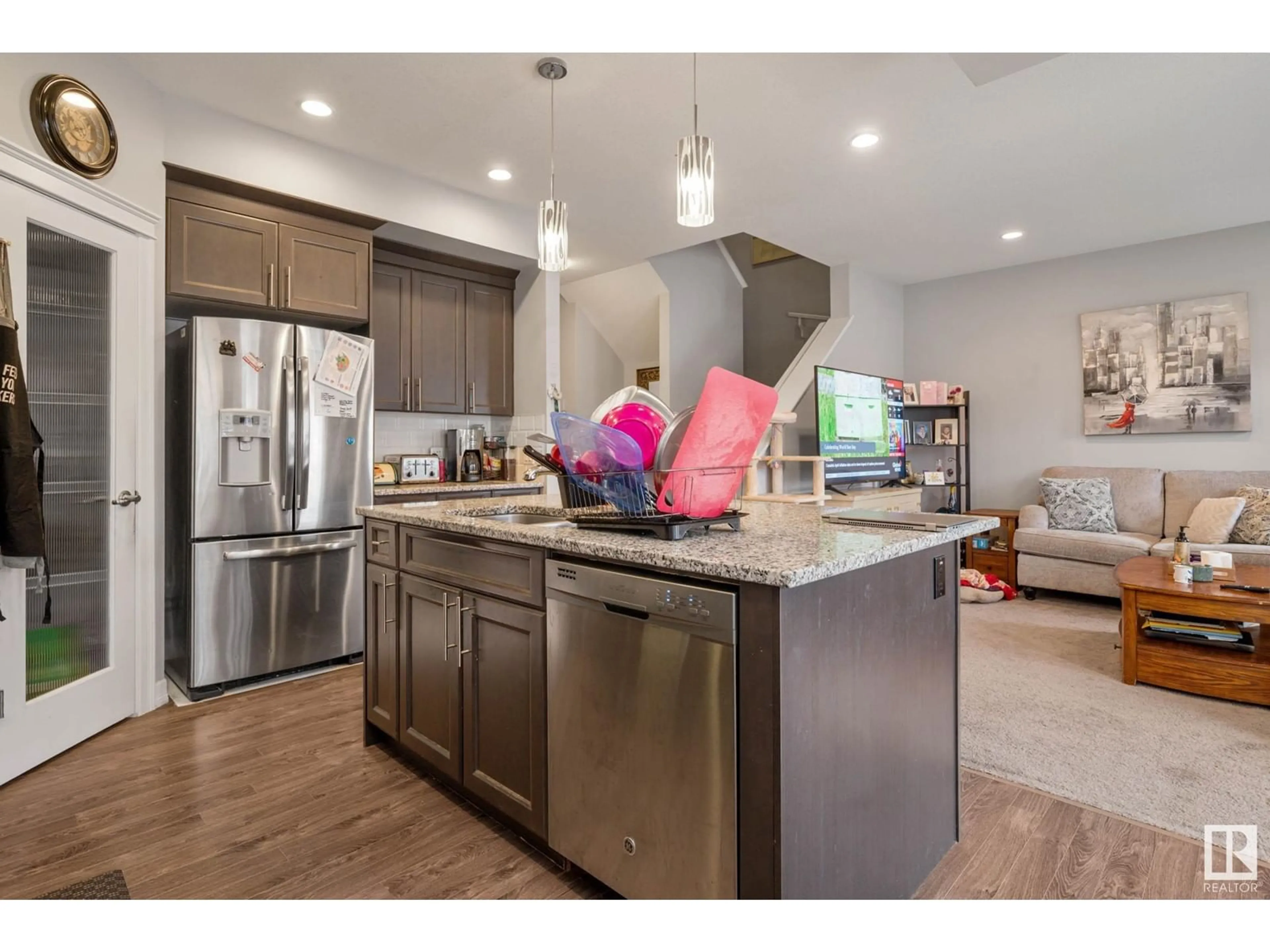 Open concept kitchen, wood/laminate floor for 424 SIMPKINS LI, Leduc Alberta T9E1B3