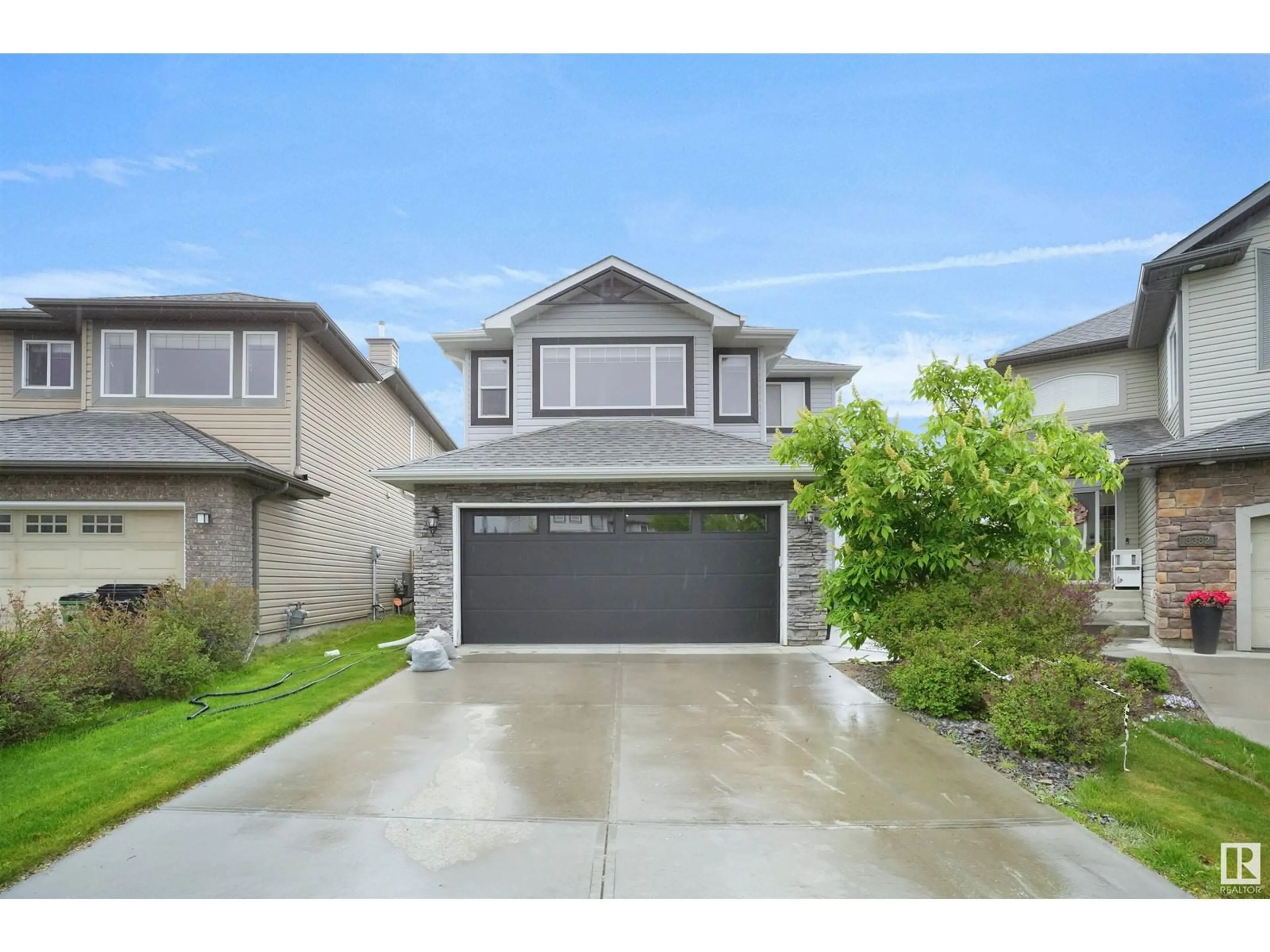 Home with vinyl exterior material, street for 8380 SHASKE CR, Edmonton Alberta T6R0B5