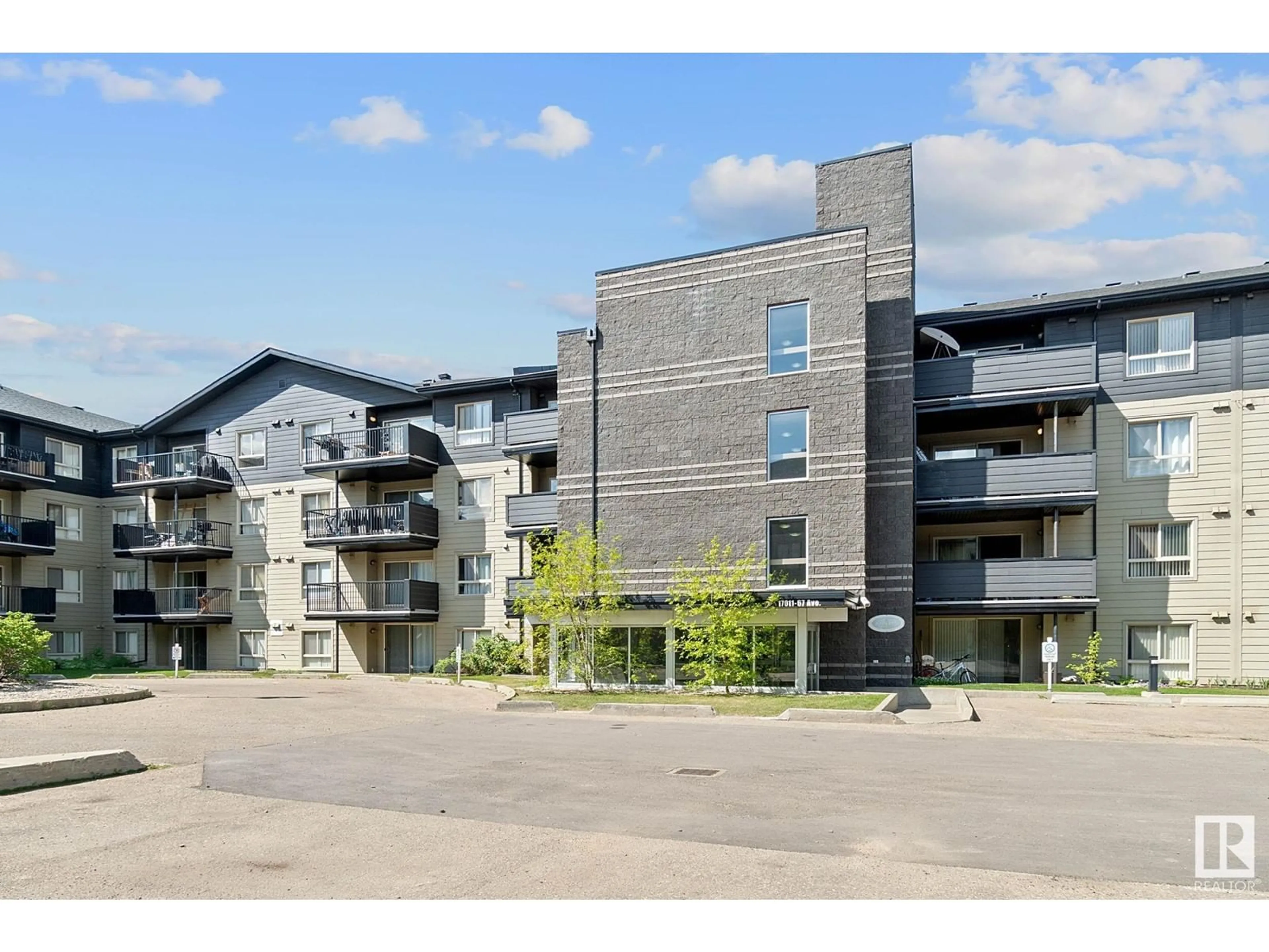 A pic from outside/outdoor area/front of a property/back of a property/a pic from drone, building for #217 - 17011 67 AV, Edmonton Alberta T5T6Y6
