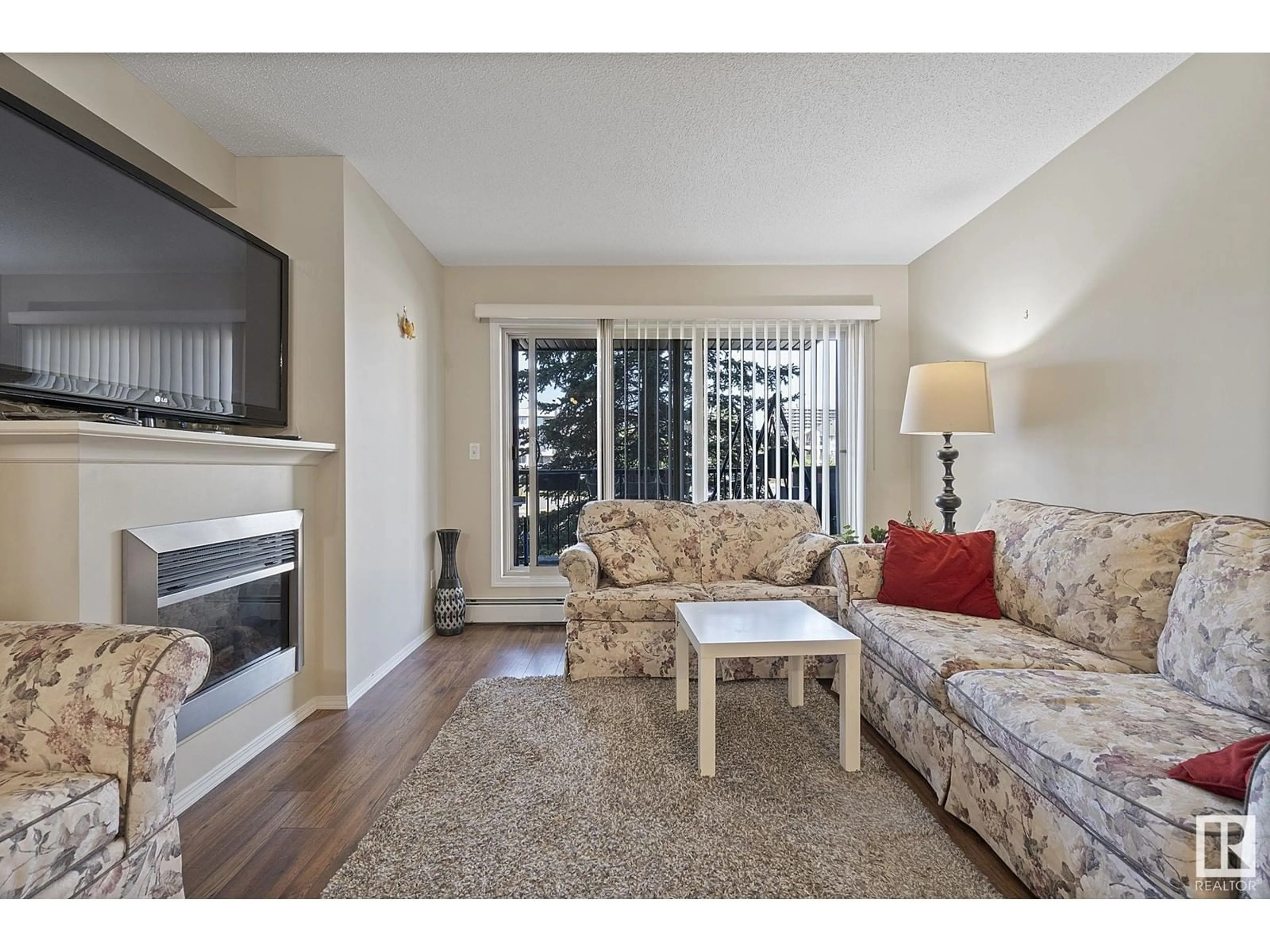 Living room with furniture, unknown for #217 - 17011 67 AV, Edmonton Alberta T5T6Y6