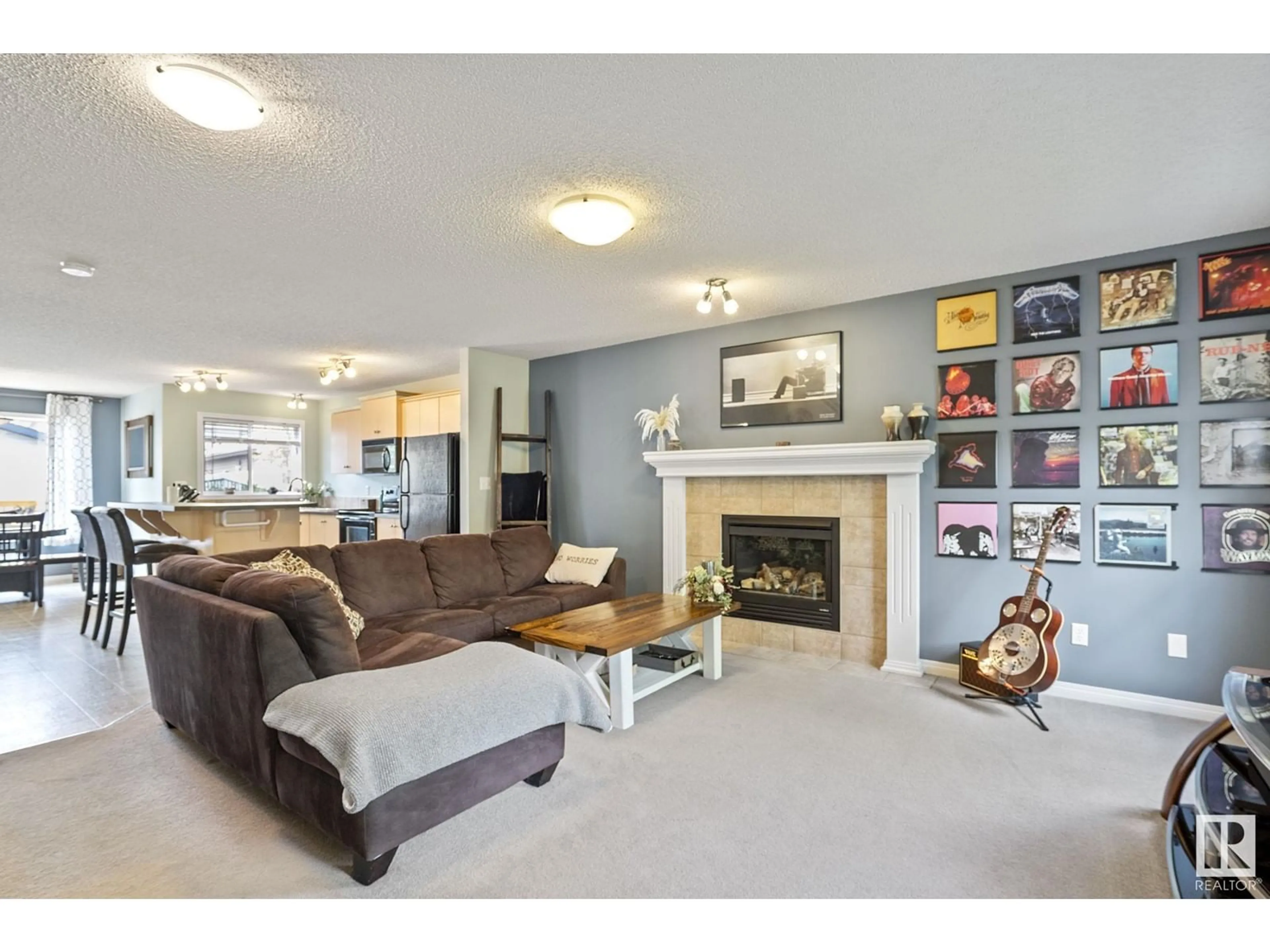 Living room with furniture, unknown for 12003 19 AV, Edmonton Alberta T6W1W5