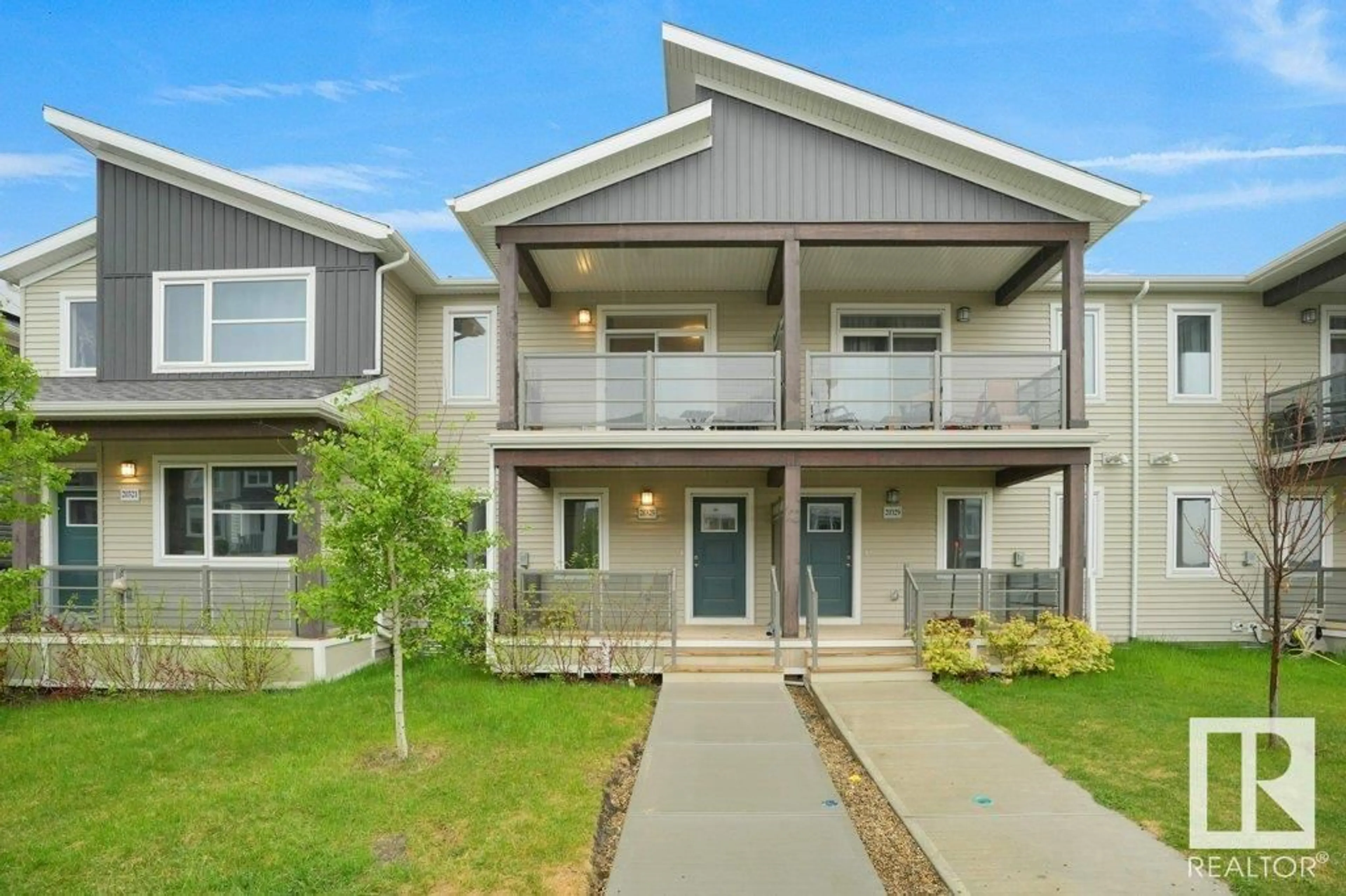 Home with vinyl exterior material, street for 20325 15A AV, Edmonton Alberta T6M1L5