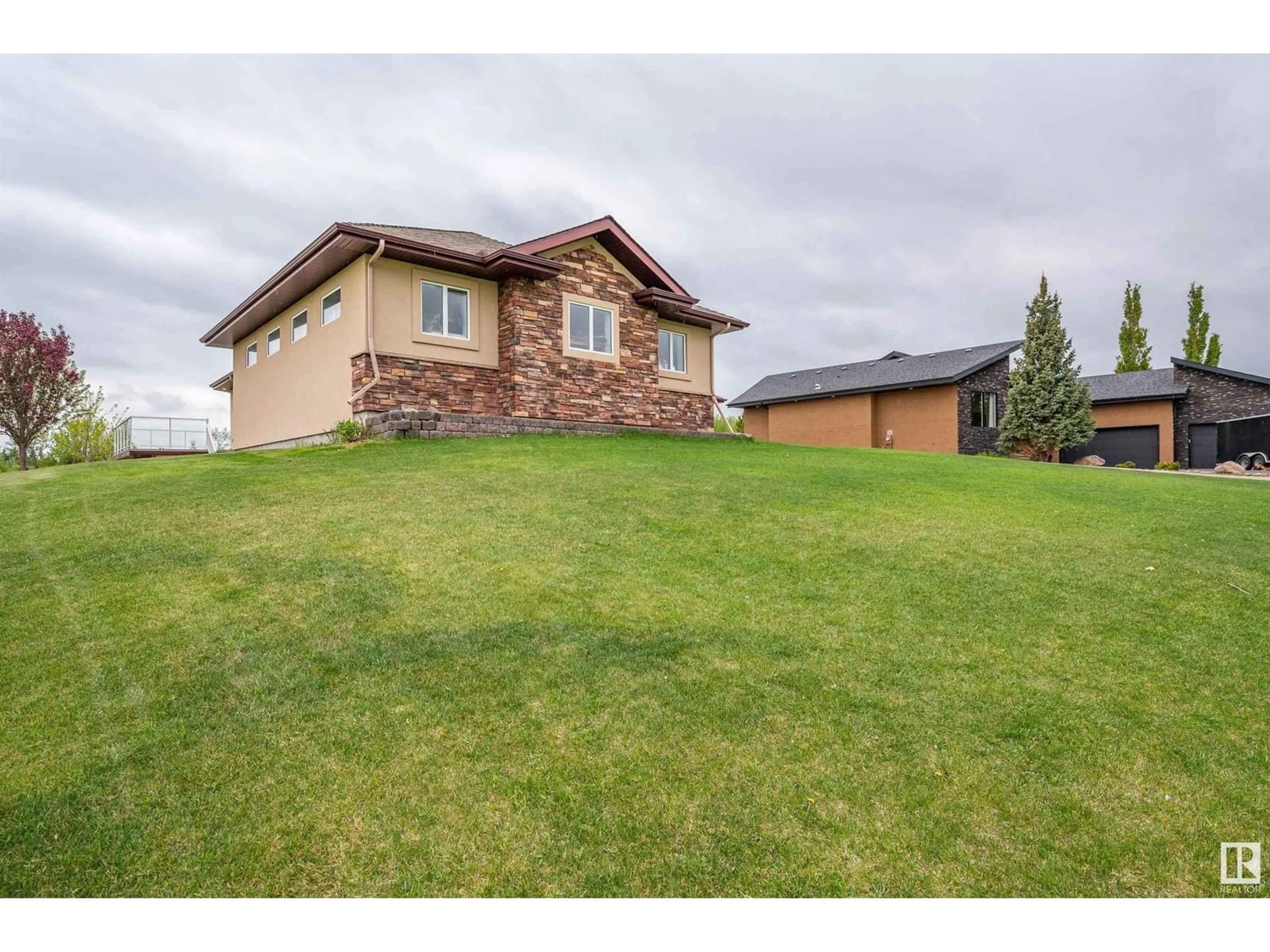 A pic from outside/outdoor area/front of a property/back of a property/a pic from drone, unknown for 133 RGE ROAD 223 RGE ROAD, Rural Strathcona County Alberta T8E2M3