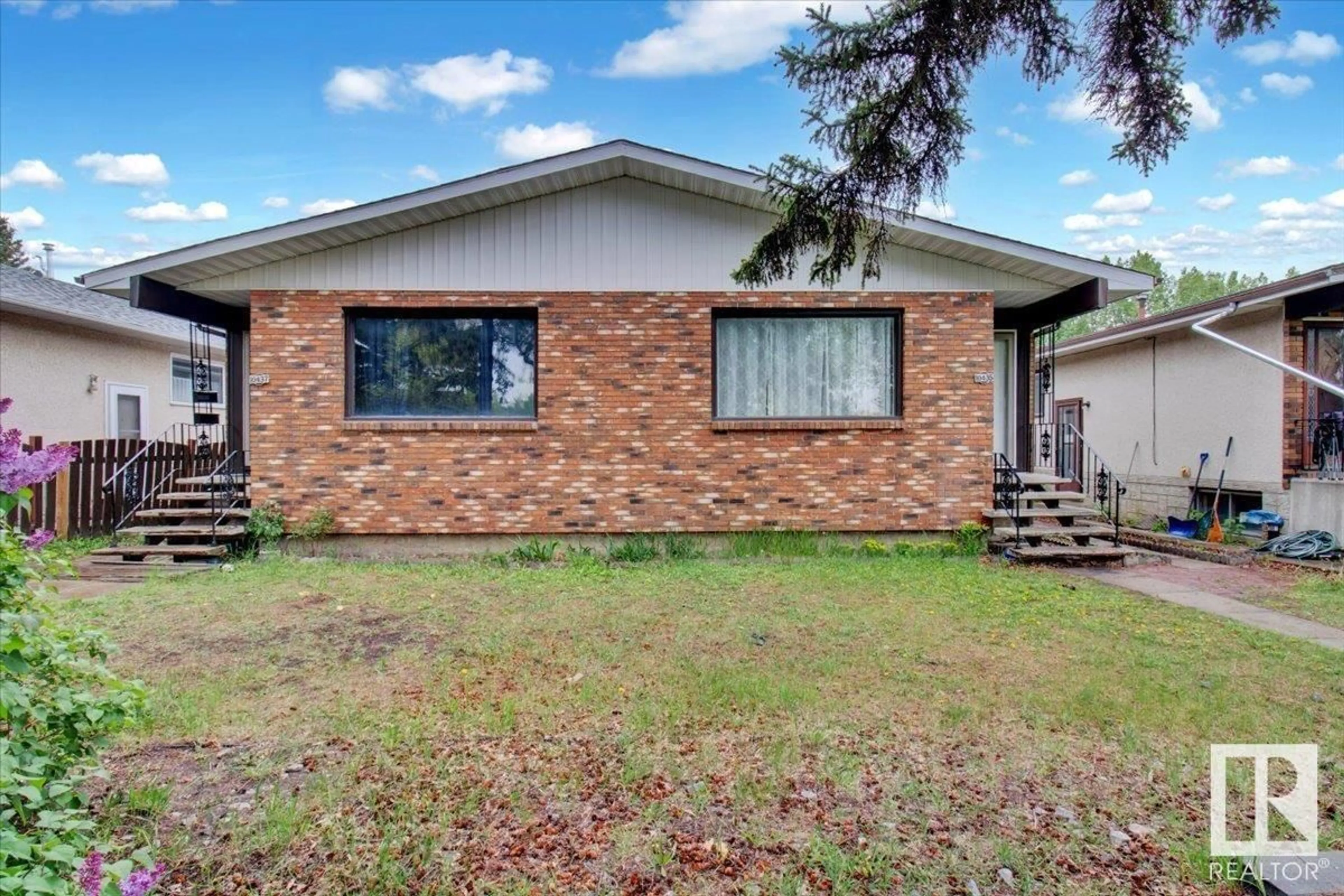 Home with brick exterior material, street for NW - 10435 10437 150 ST, Edmonton Alberta T5P1P7