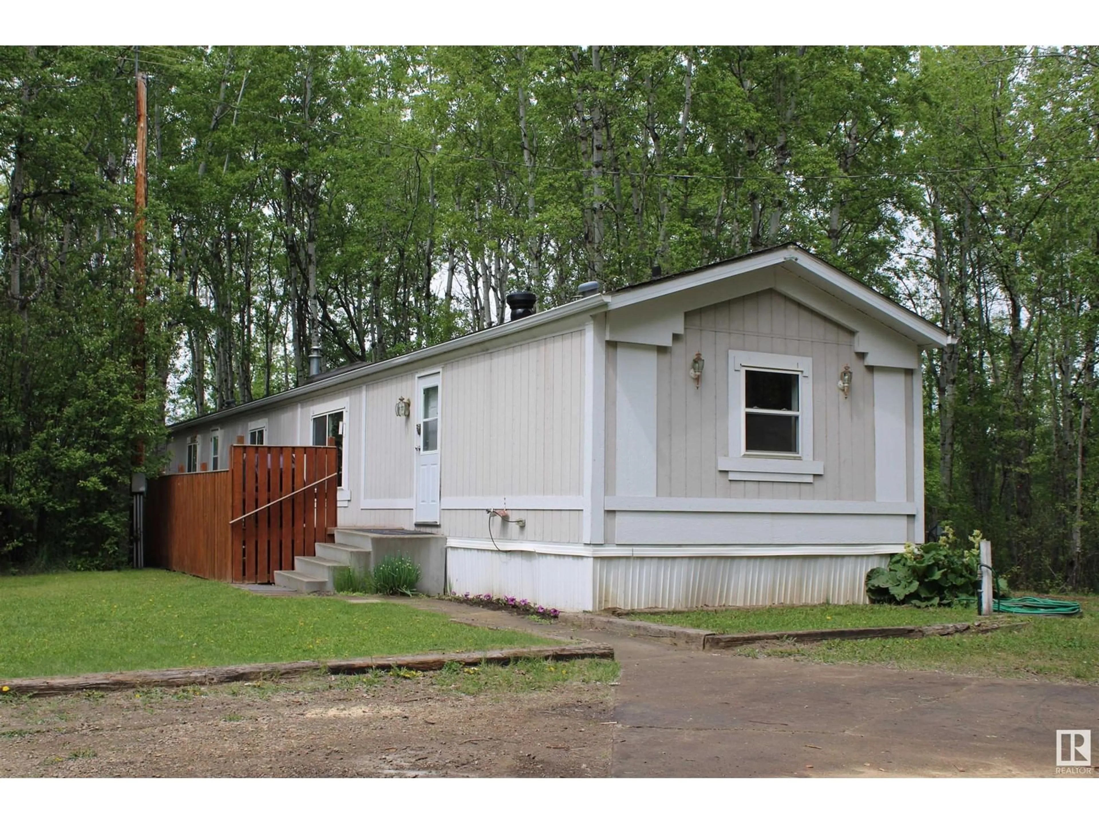 Home with vinyl exterior material, street for 1104 TWP ROAD 545, Rural Lac Ste. Anne County Alberta T0E1V0