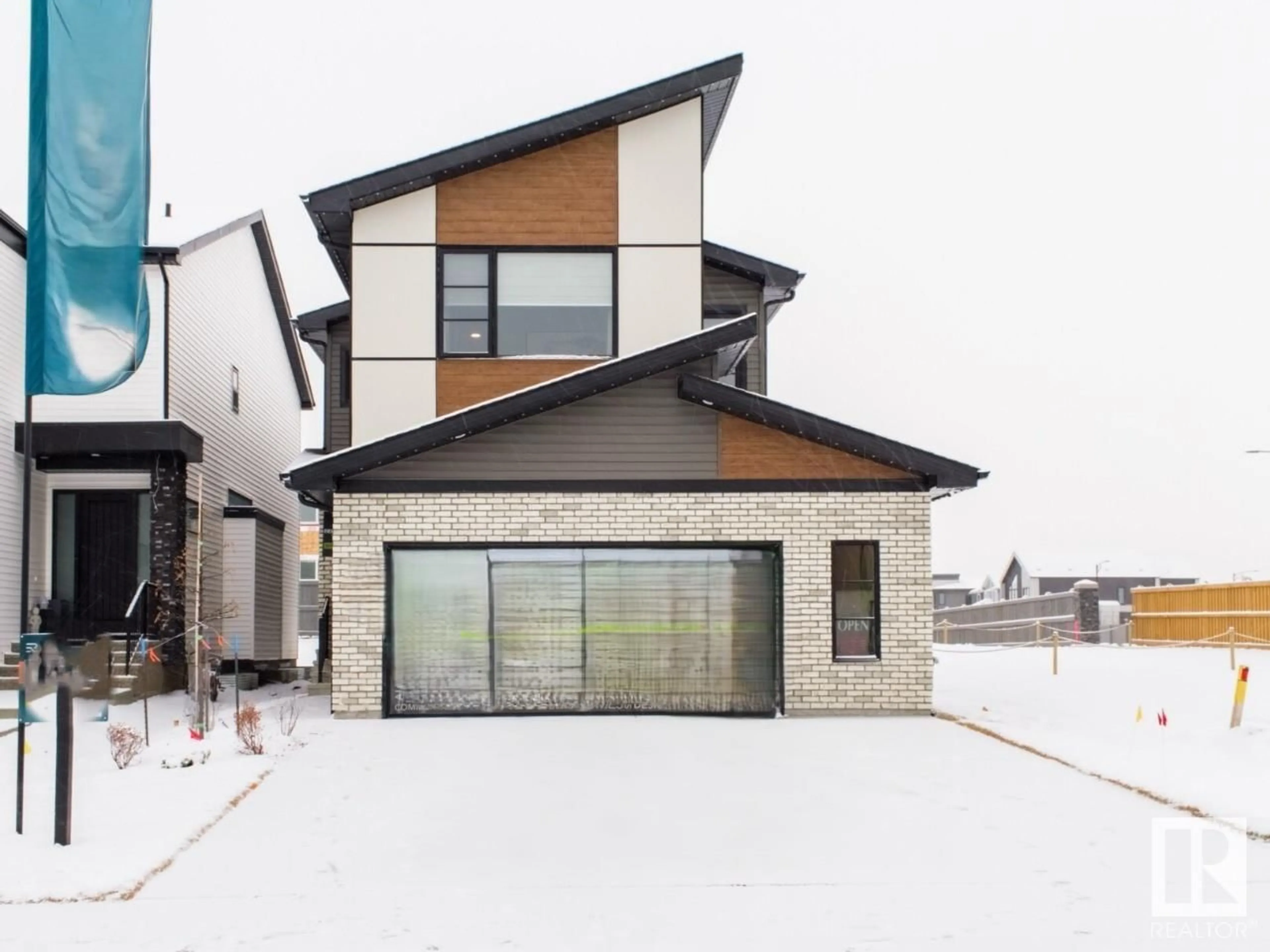 Home with brick exterior material, street for SW - 7005 KIVIAQ CR, Edmonton Alberta T6W1A5