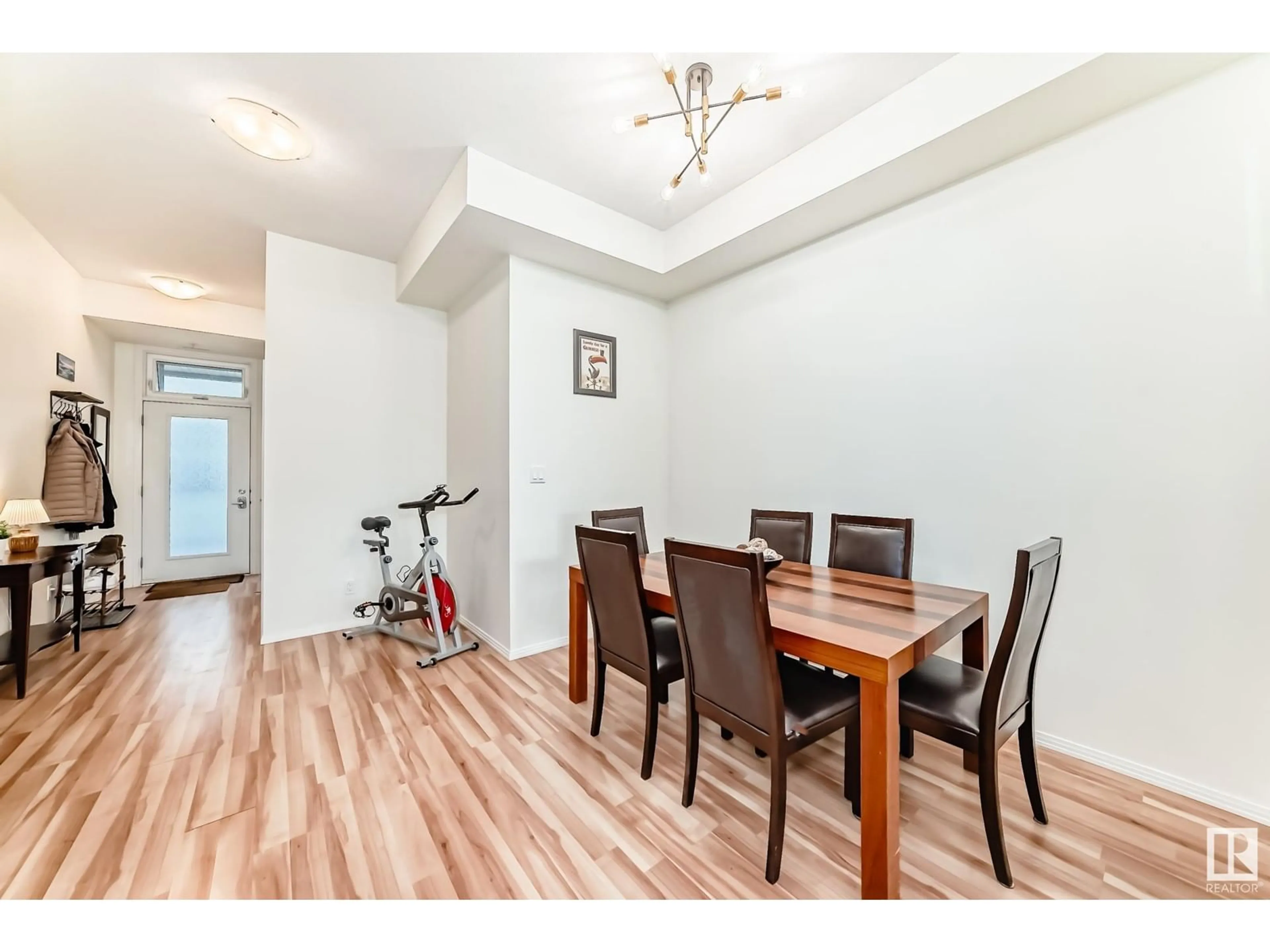 Dining room, wood/laminate floor for #303 - 10531 117 ST, Edmonton Alberta T5H0A8
