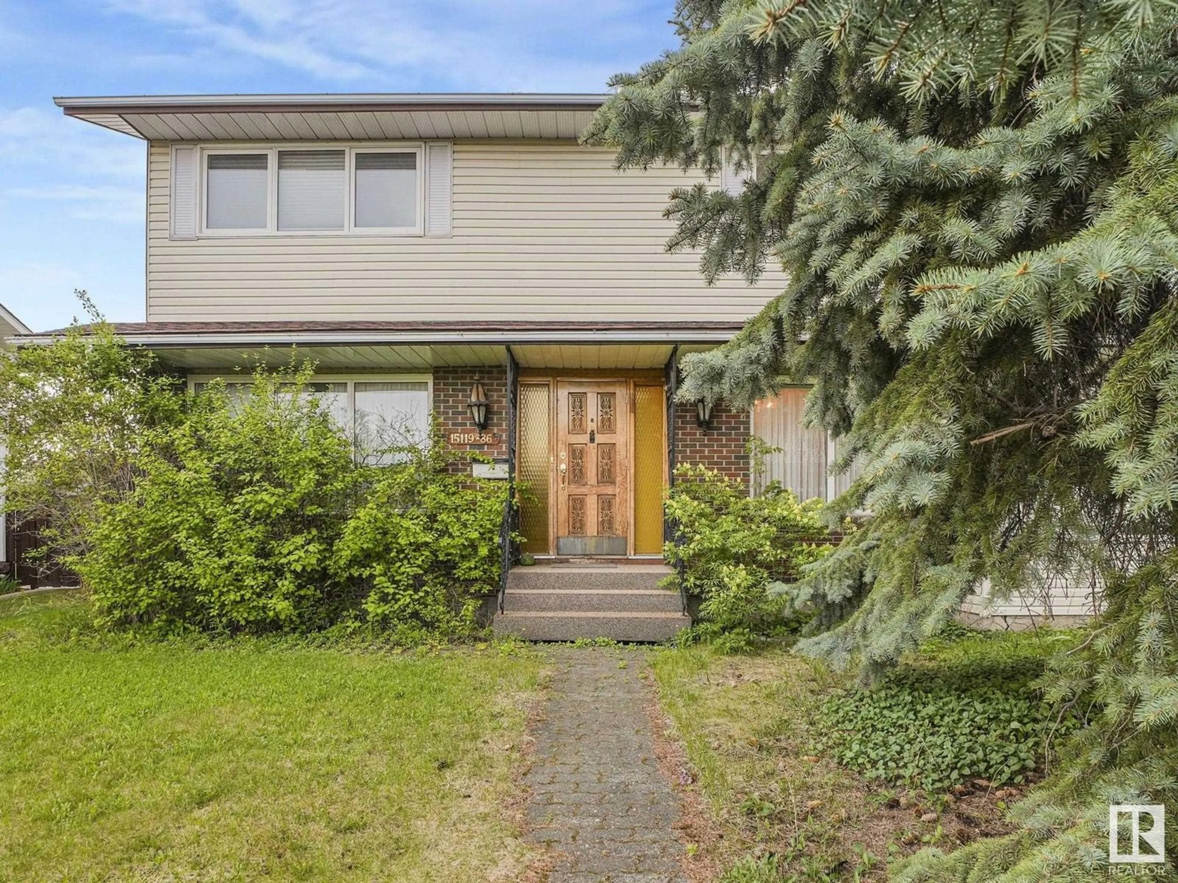 Home with vinyl exterior material, street for NW - 15119 86 ST, Edmonton Alberta T5E5X5