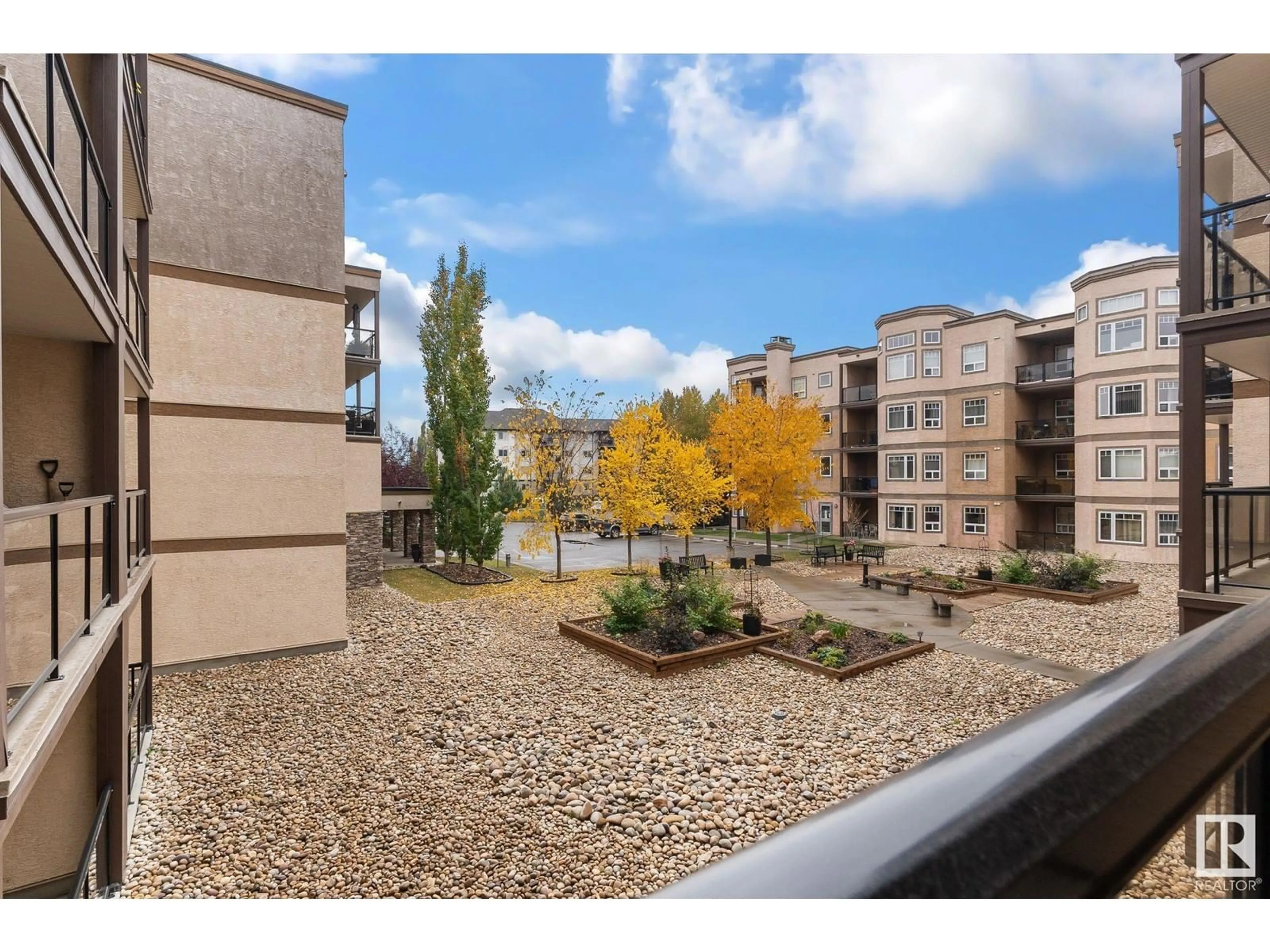 Patio, city buildings view from balcony for 405 - 2045 GRANTHAM CO, Edmonton Alberta T5T3X4