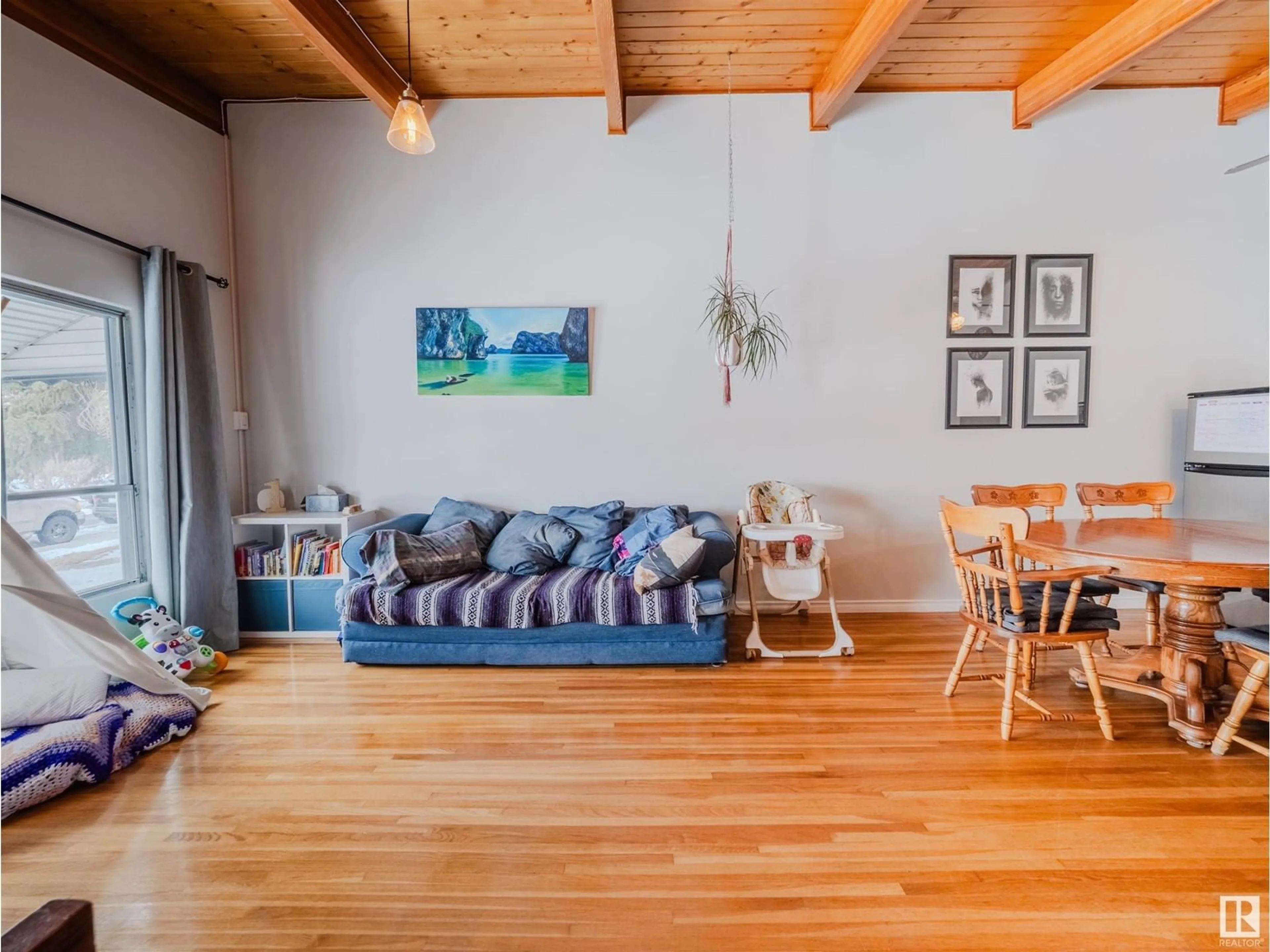 Living room with furniture, wood/laminate floor for 9023 60 ST, Edmonton Alberta T6B1M7
