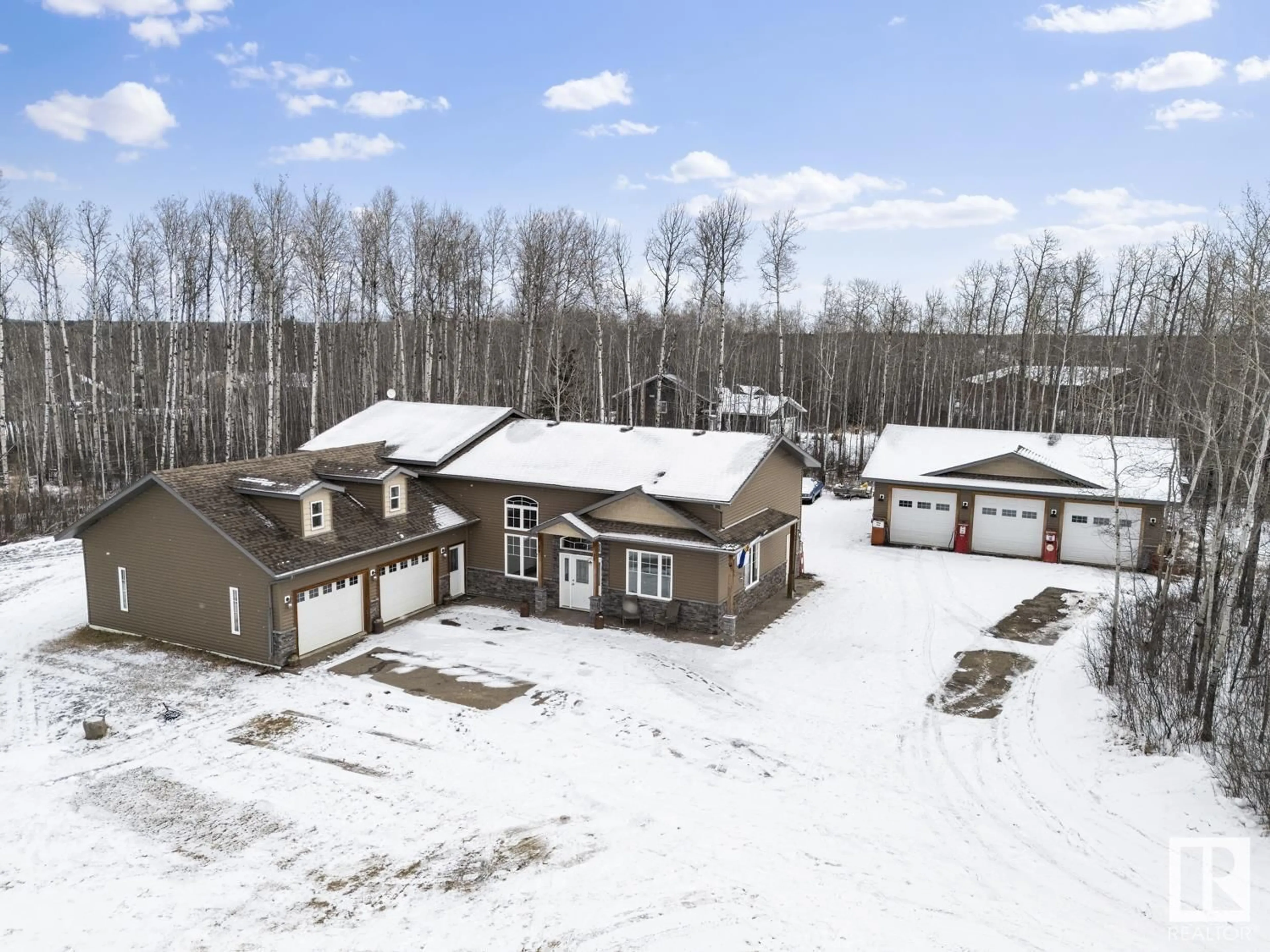 A pic from outside/outdoor area/front of a property/back of a property/a pic from drone, building for 62029 RGE RD 421, Rural Bonnyville M.D. Alberta T9M1P2