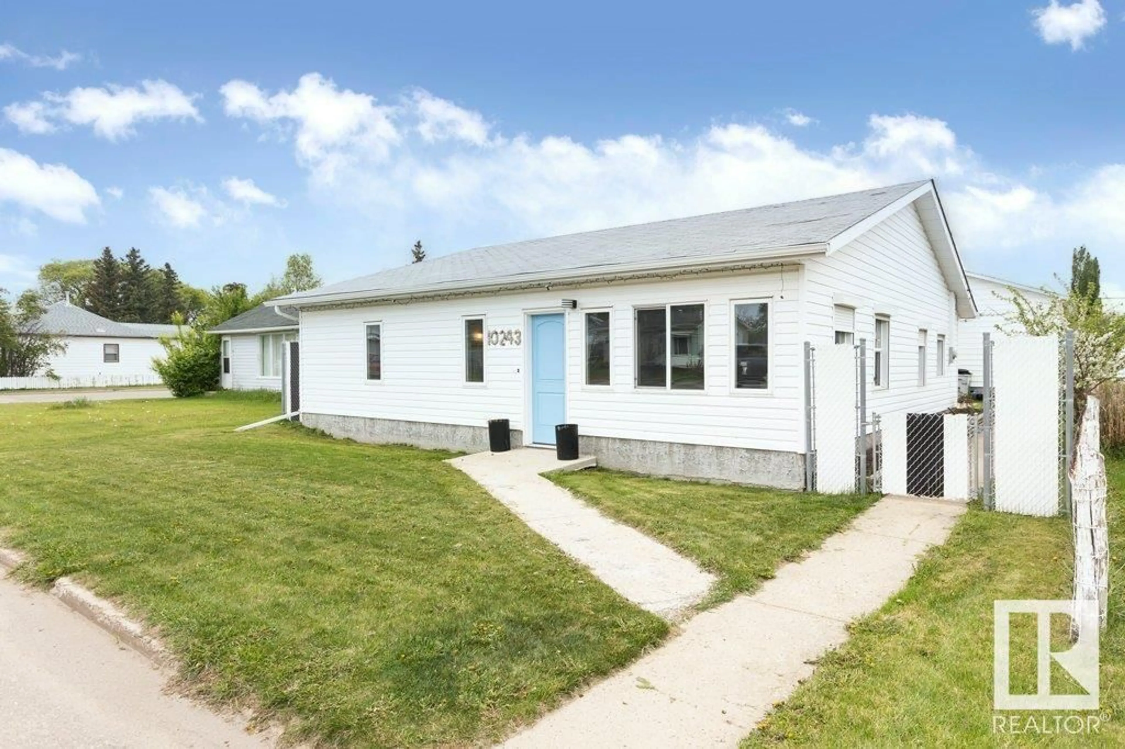 Home with vinyl exterior material, street for 10243 107 ST, Westlock Alberta T7P1X1