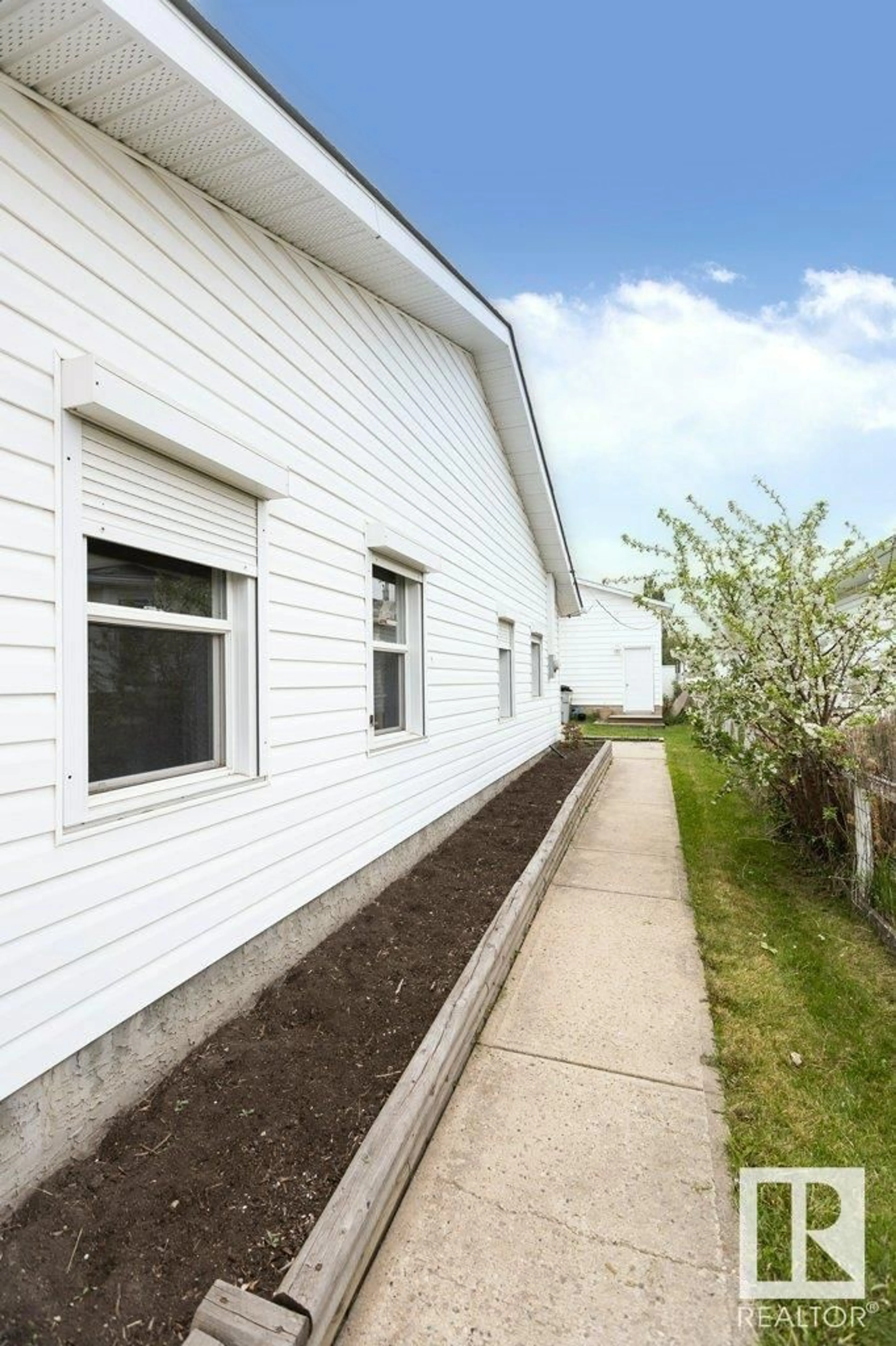 Home with vinyl exterior material, street for 10243 107 ST, Westlock Alberta T7P1X1