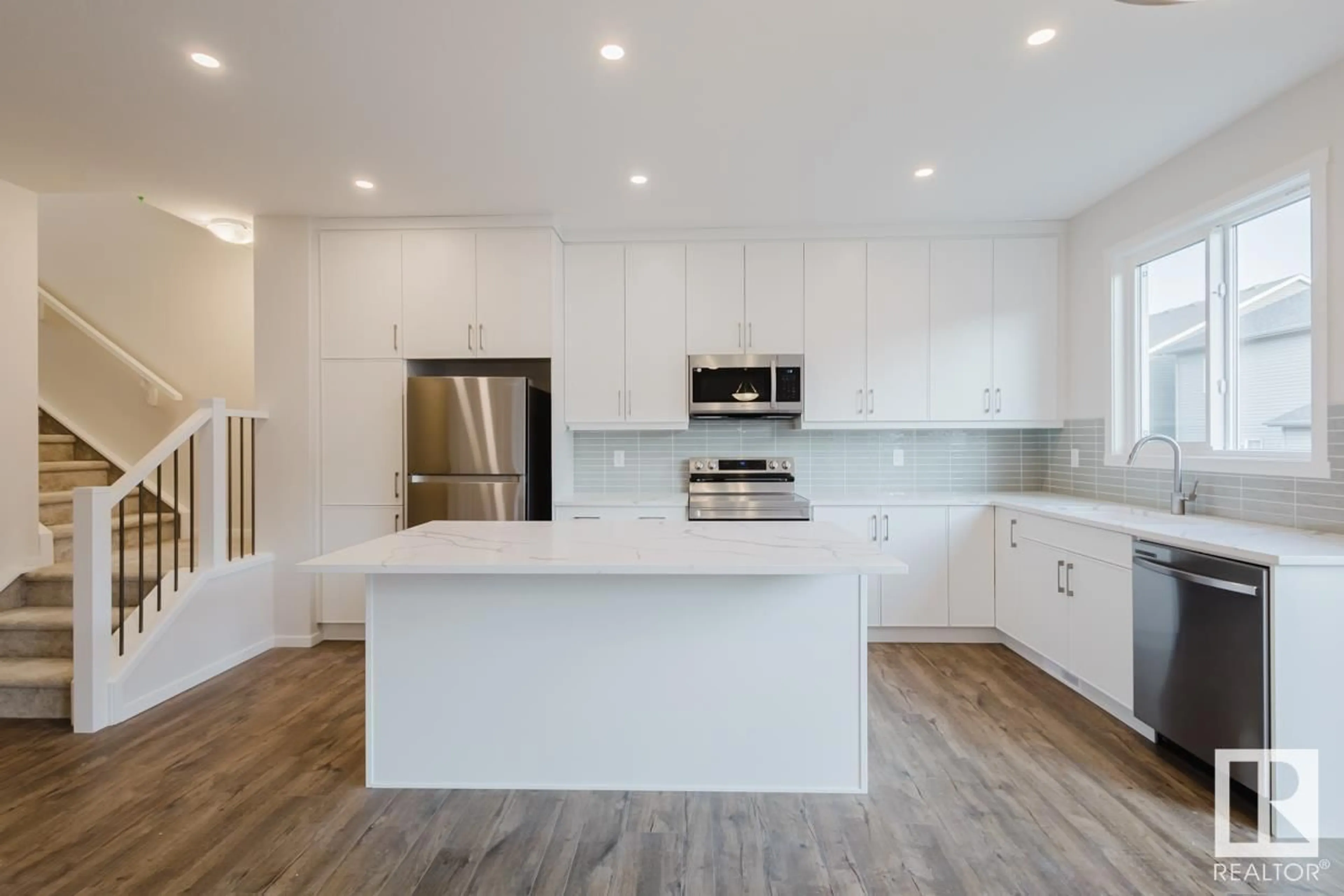 Open concept kitchen, unknown for NW - 2035 209 ST, Edmonton Alberta T6M2X6