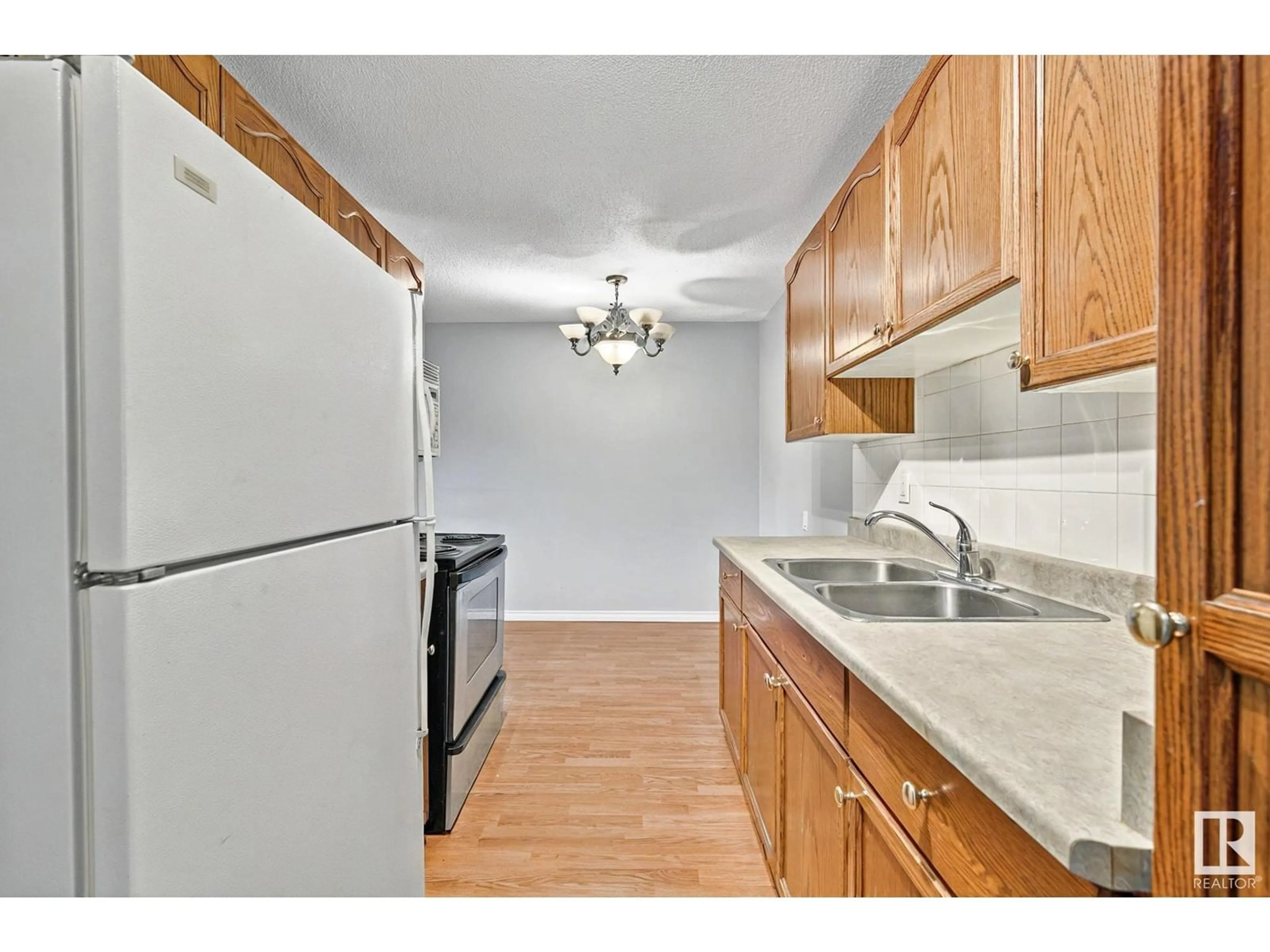 Standard kitchen, unknown for #104 - 10230 114 ST, Edmonton Alberta T5K1R9