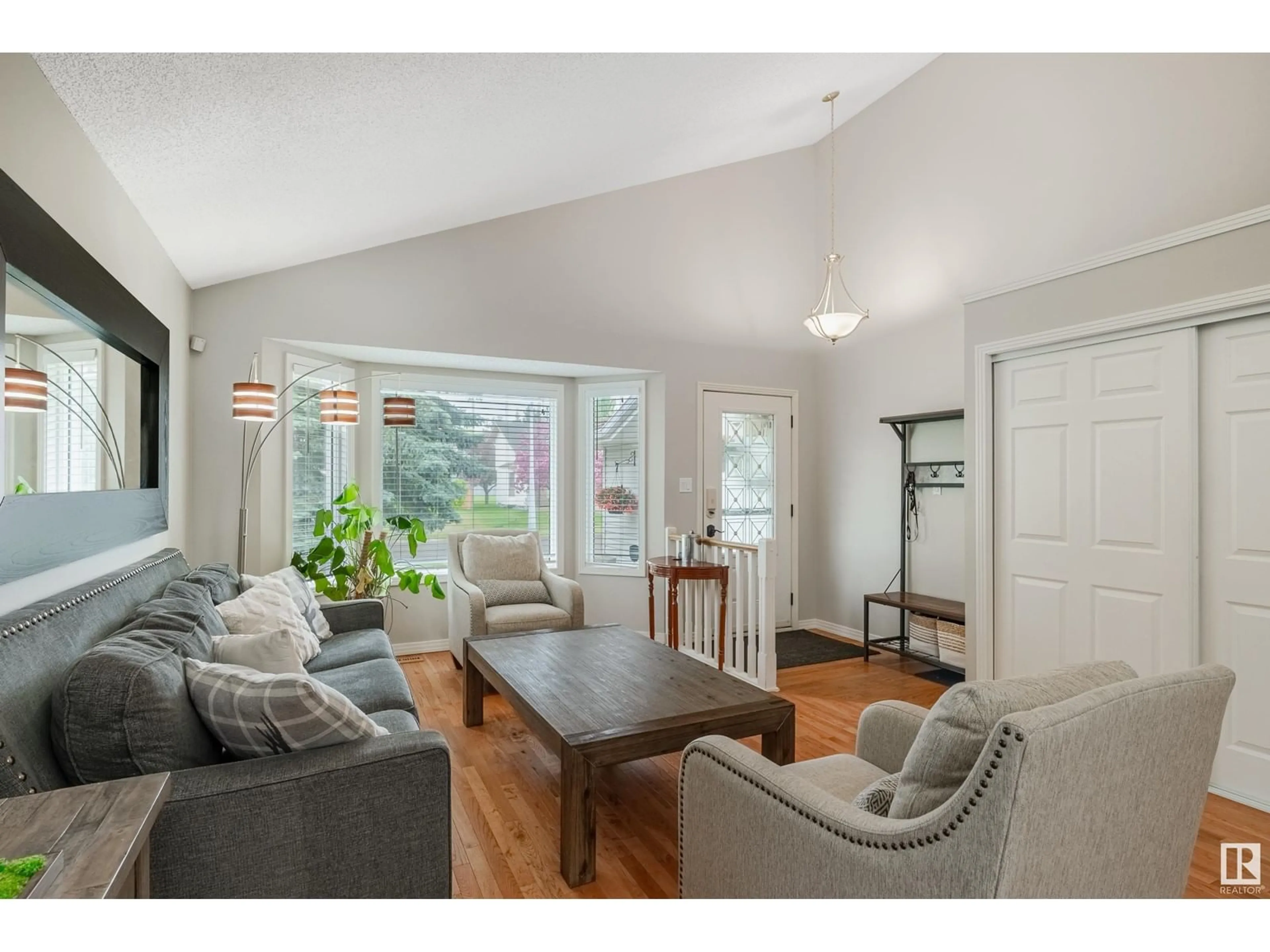 Living room with furniture, wood/laminate floor for 19 HOLMGREN CR, St. Albert Alberta T8N5V3
