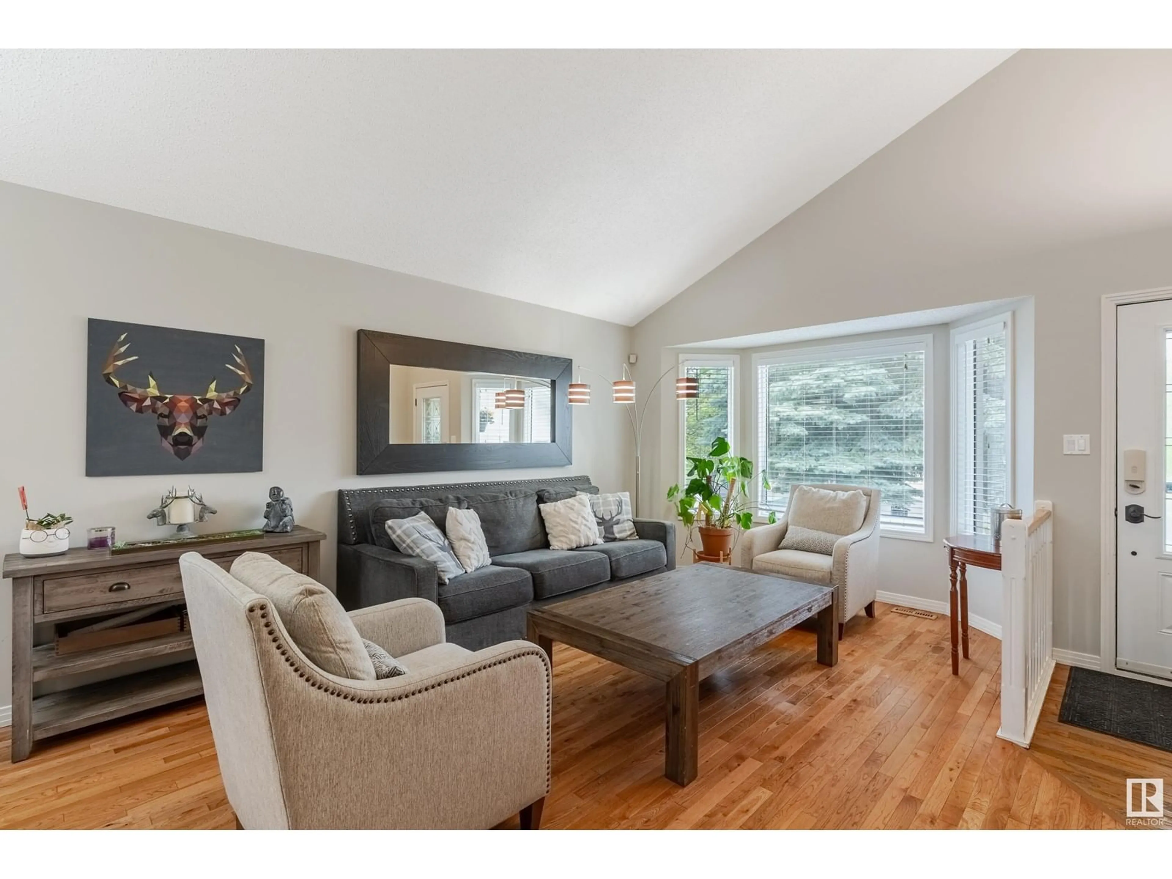 Living room with furniture, wood/laminate floor for 19 HOLMGREN CR, St. Albert Alberta T8N5V3
