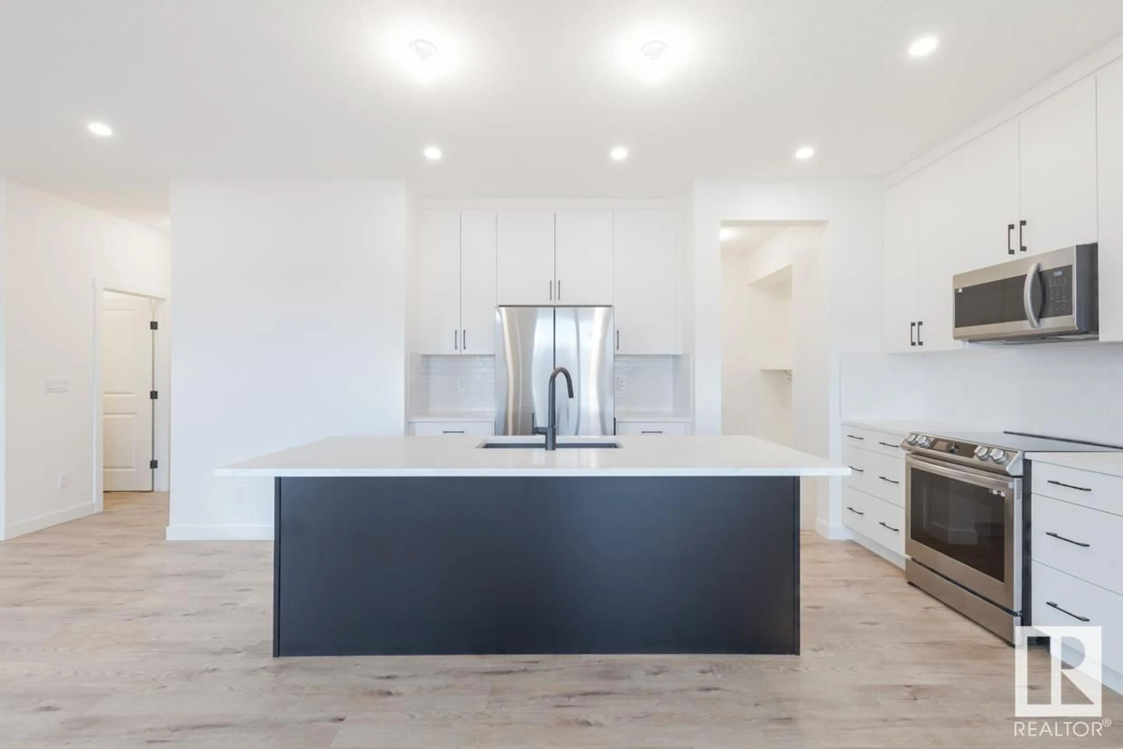 Open concept kitchen, unknown for 2119 209 ST, Edmonton Alberta T6M2X6