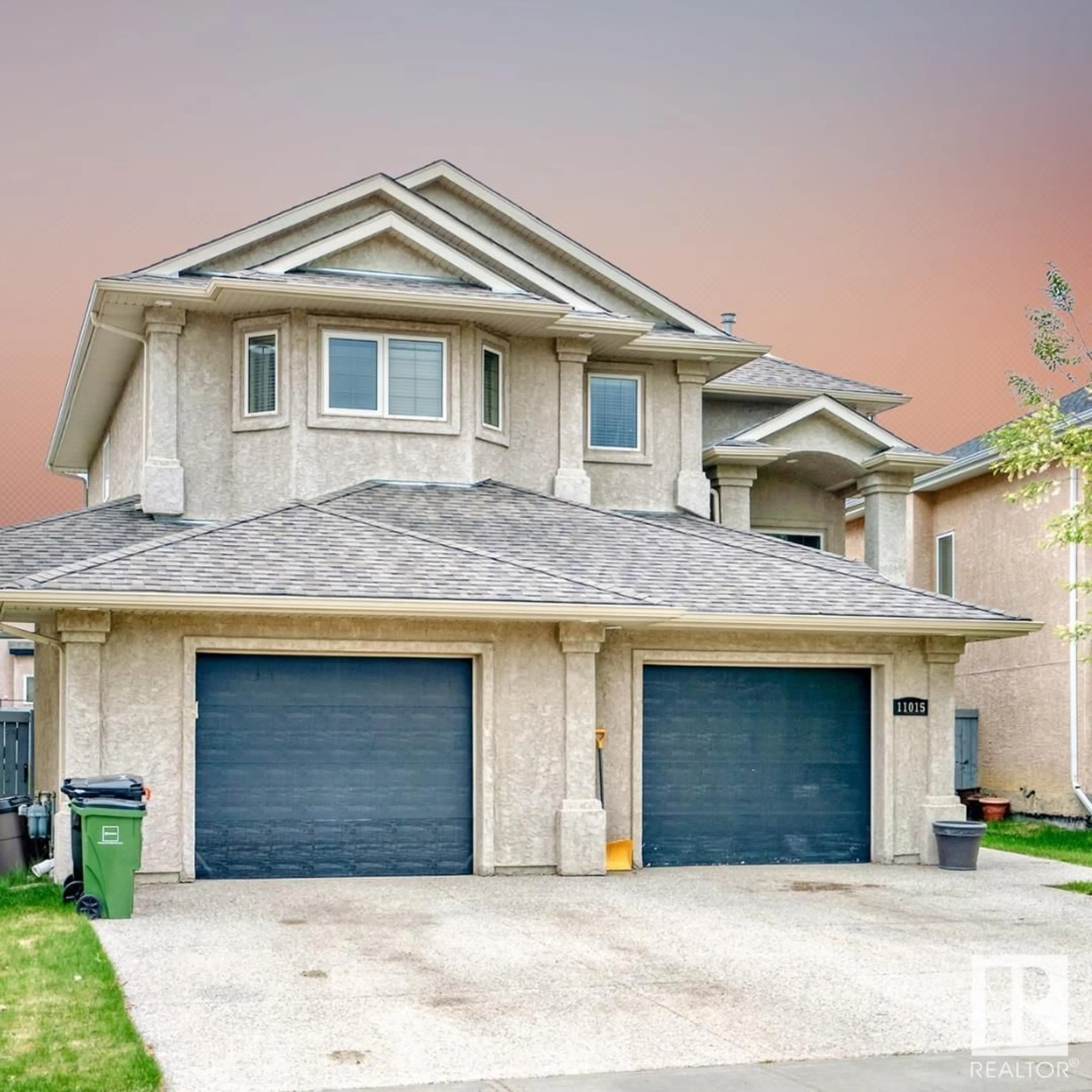 Home with vinyl exterior material, street for NW - 11015 178 AV, Edmonton Alberta T5X6J3