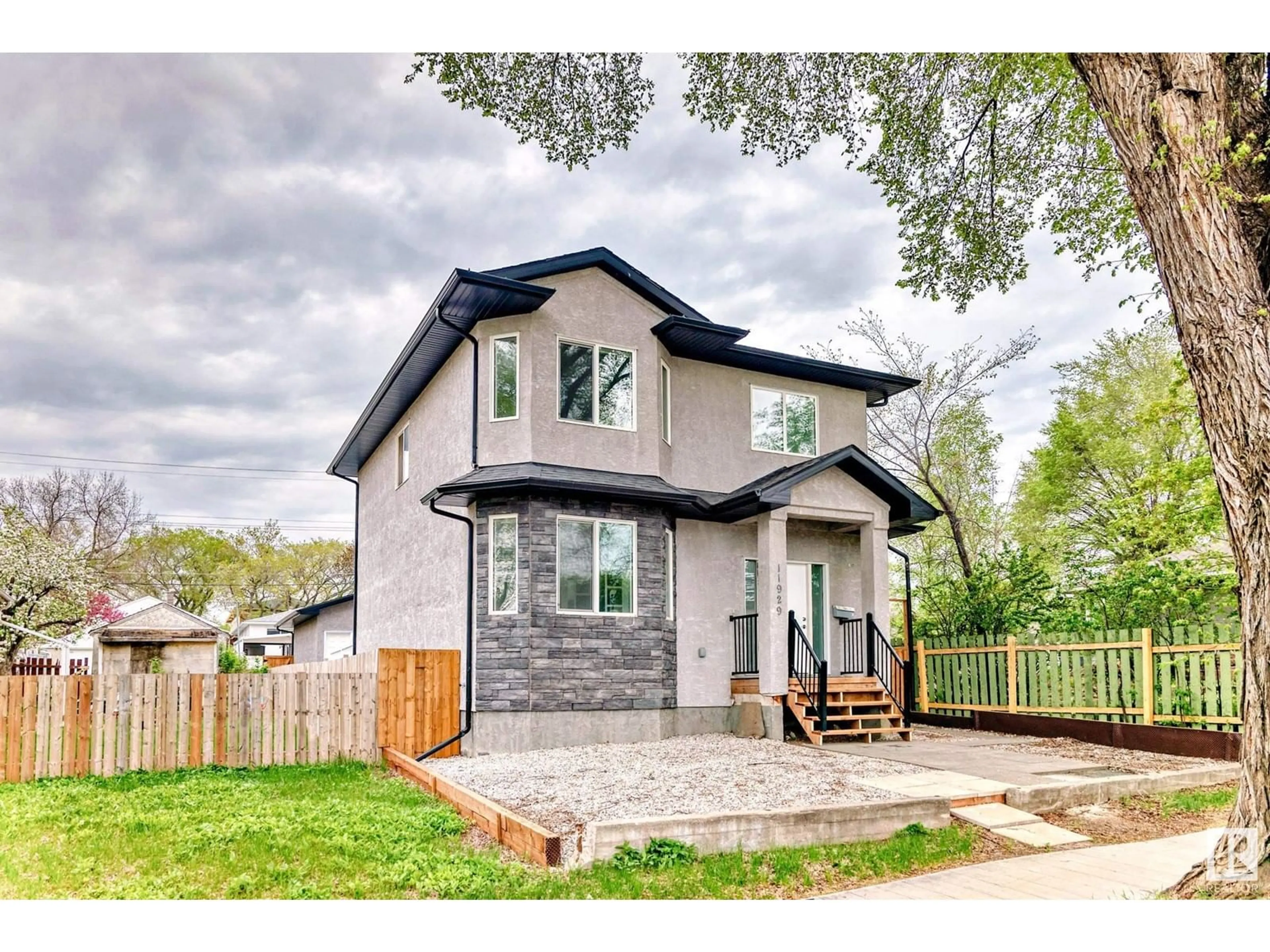 Home with brick exterior material, street for NW - 11929 70 ST, Edmonton Alberta T5B1V1