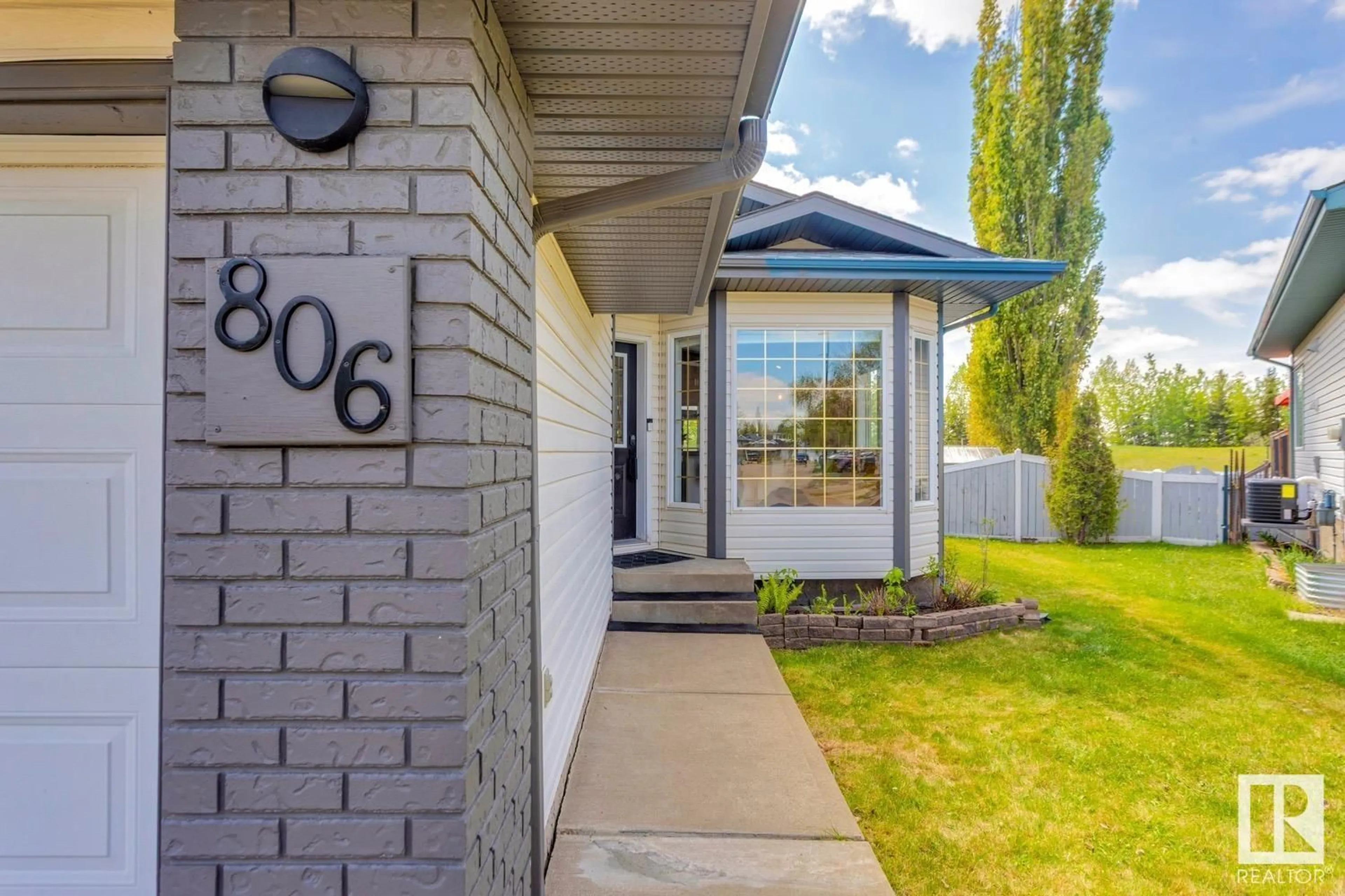 Home with brick exterior material, street for NW - 806 118A ST, Edmonton Alberta T6J6Z9