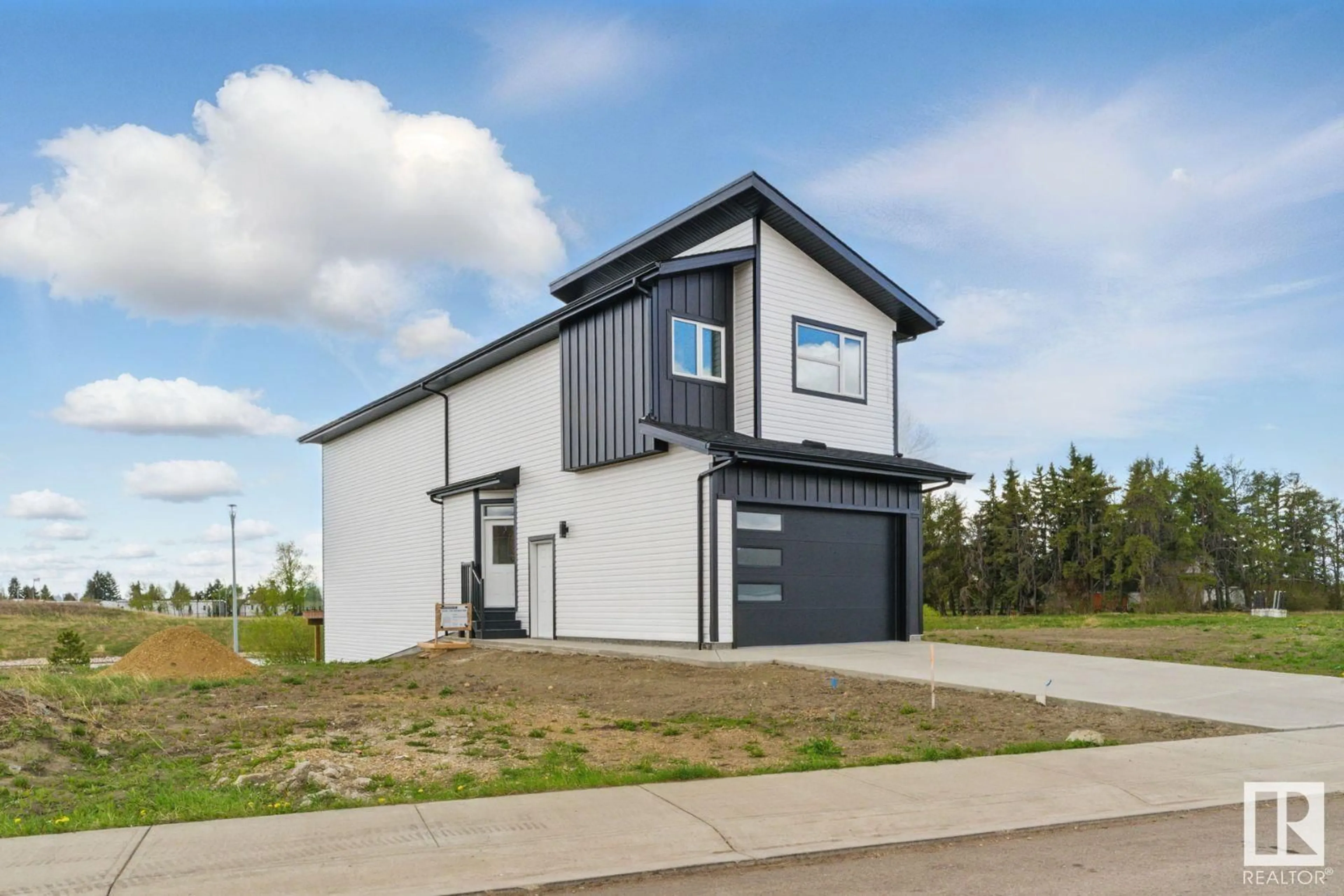 Home with vinyl exterior material, building for 9239 156 AV, Edmonton Alberta T5Y2N4