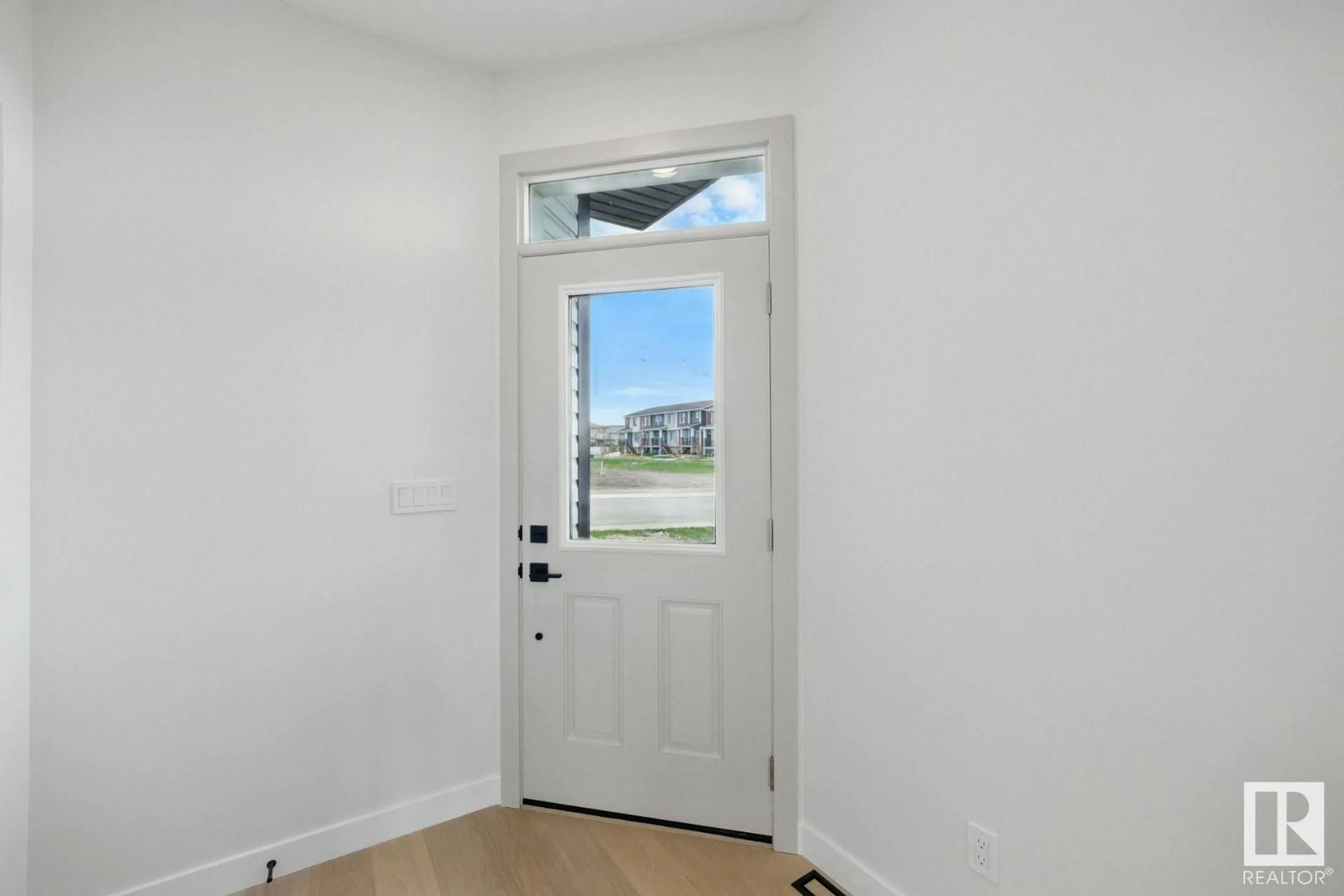 Indoor entryway for 9239 156 AV, Edmonton Alberta T5Y2N4