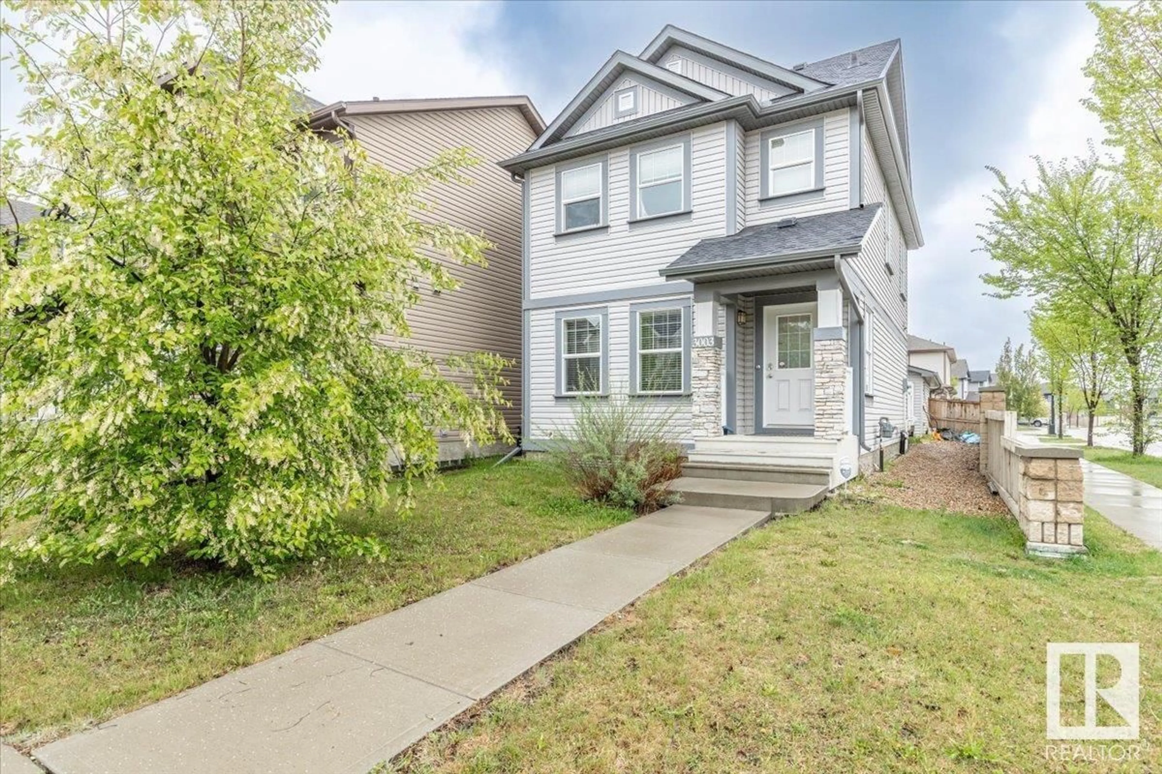 Home with vinyl exterior material, street for 3003 ARTHURS CR, Edmonton Alberta T6W2H9