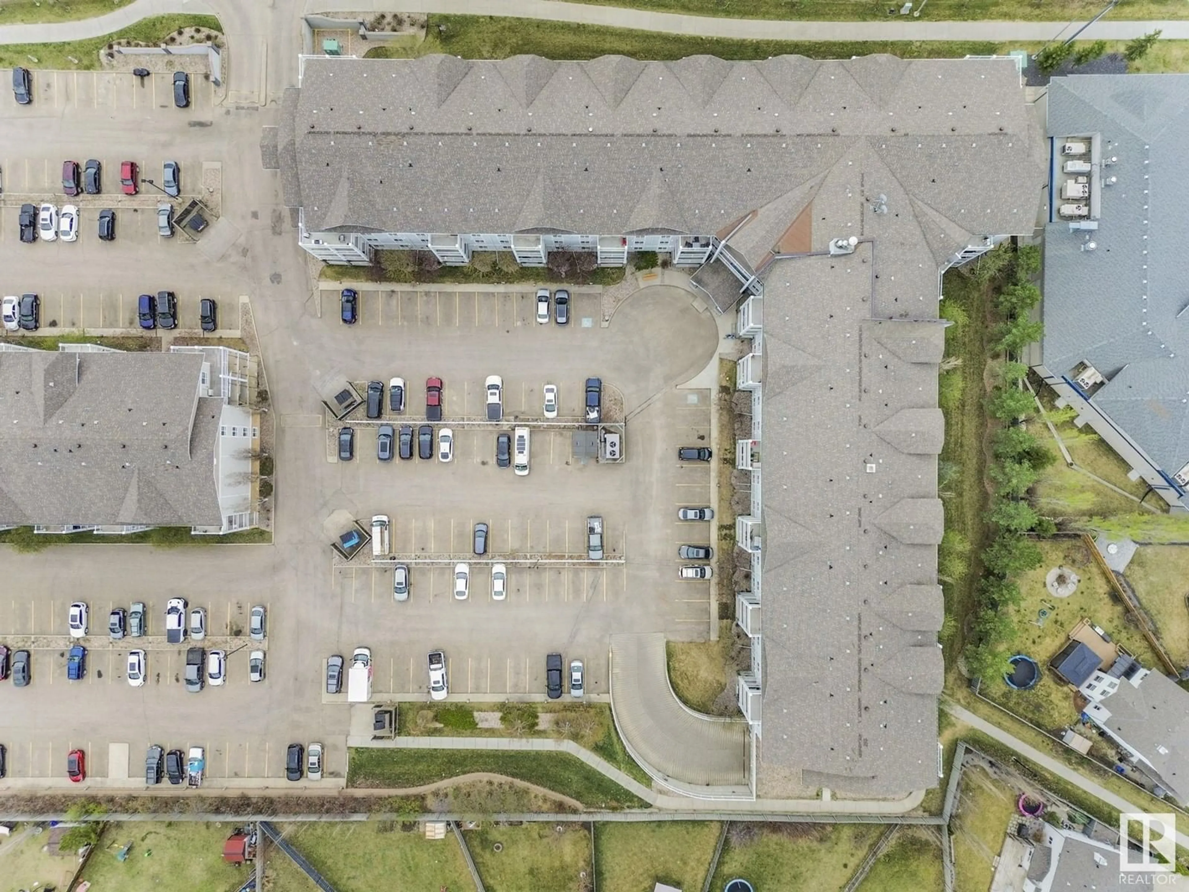 A pic from outside/outdoor area/front of a property/back of a property/a pic from drone, street for #220 - 5340 199 ST, Edmonton Alberta T6M0A5
