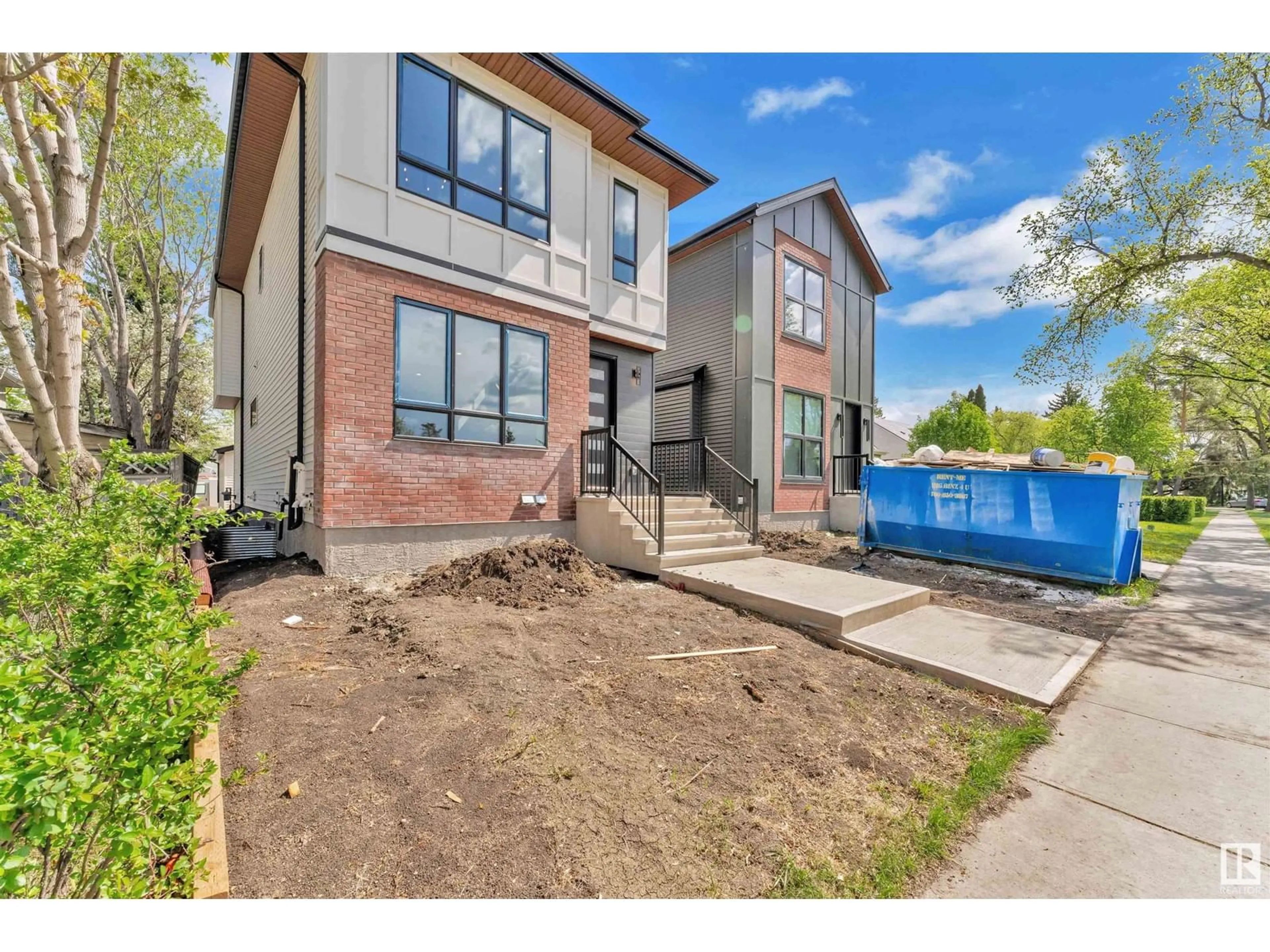 Home with brick exterior material, street for NW - 10725 132 ST, Edmonton Alberta T5M1C8
