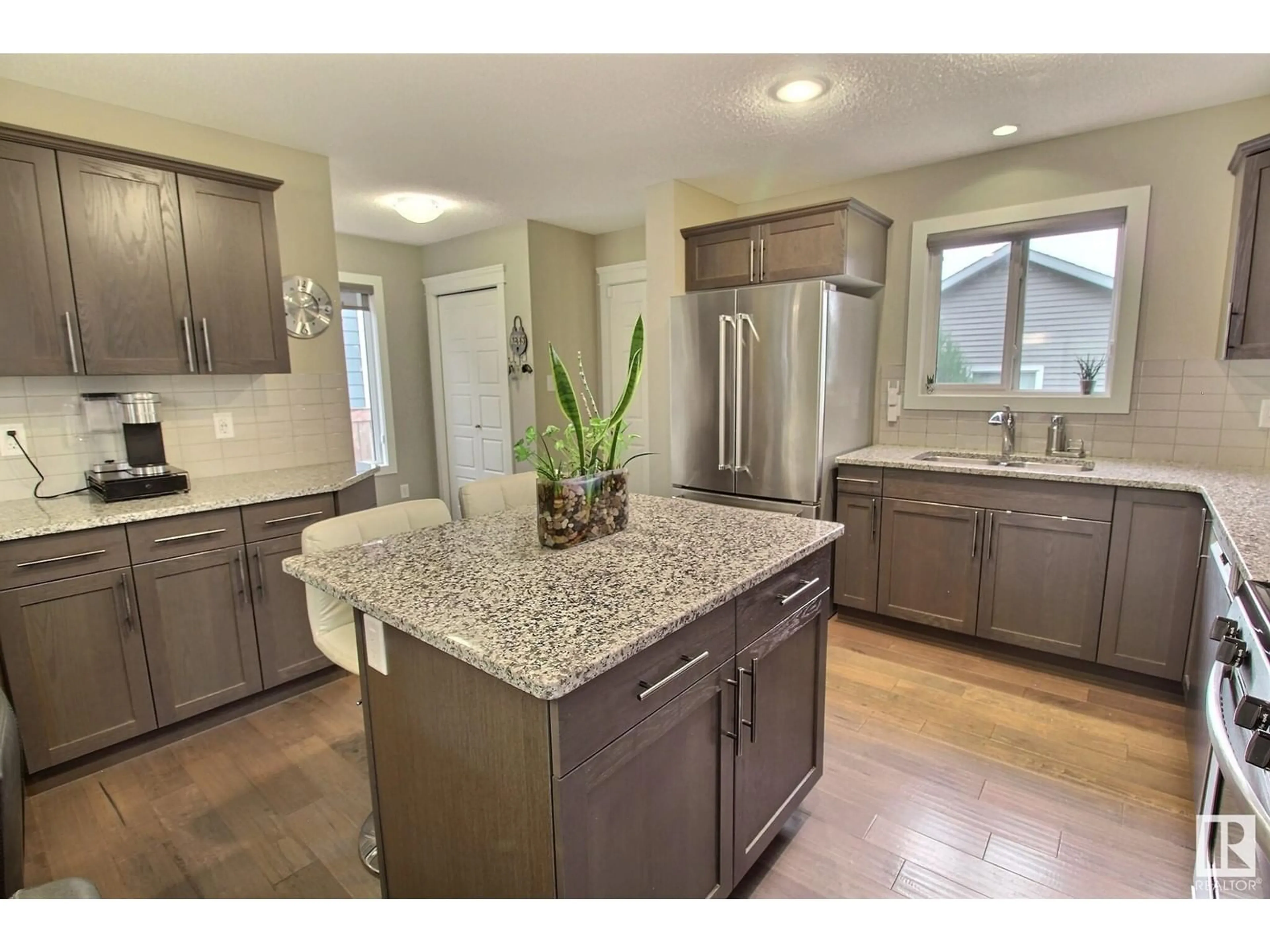 Open concept kitchen, unknown for 16020 12 AV, Edmonton Alberta T6W2W6