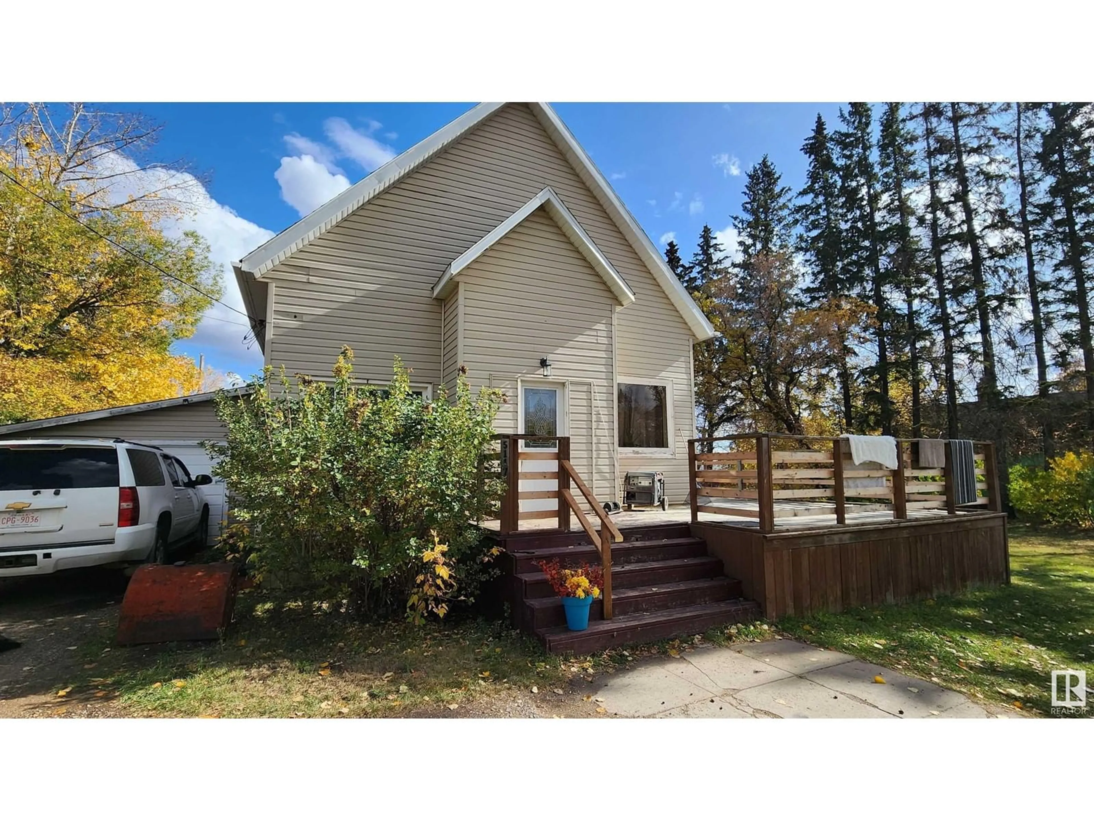 Home with vinyl exterior material, street for 5117 48 ST, Elk Point Alberta T0A1A0