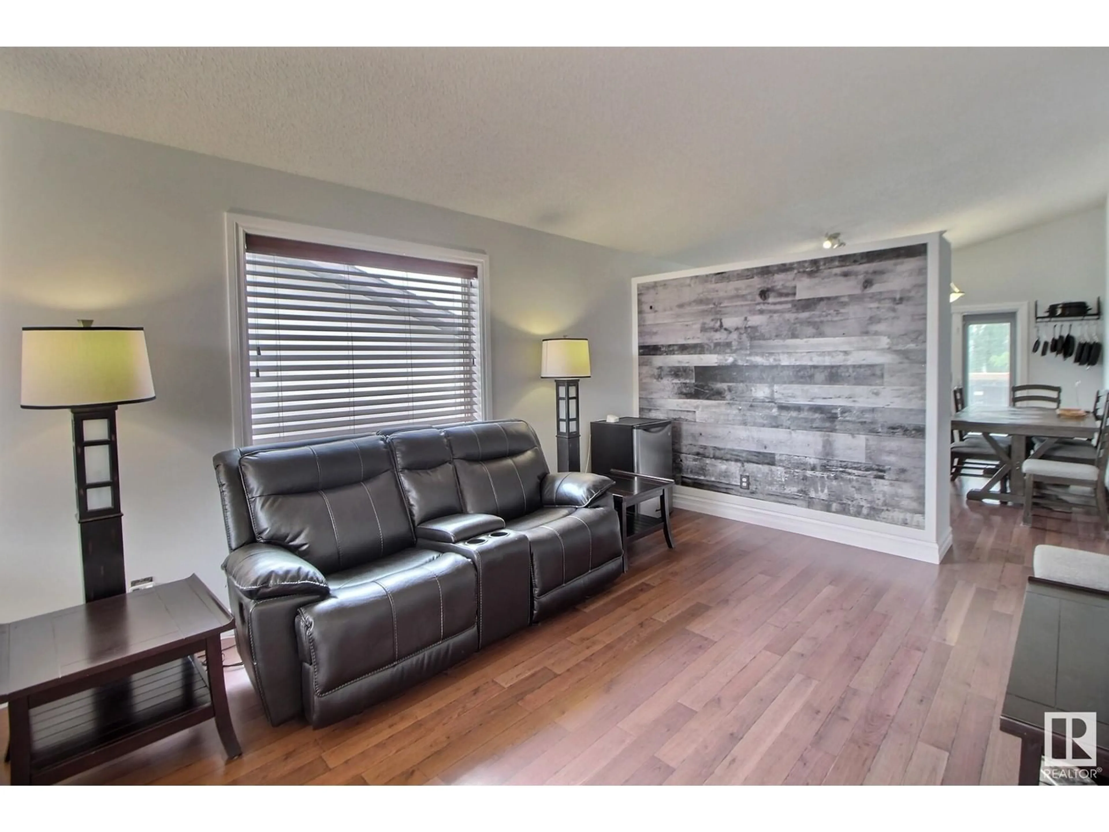 Living room with furniture, wood/laminate floor for 95 LANDSDOWNE DR, Spruce Grove Alberta T7X3Z8