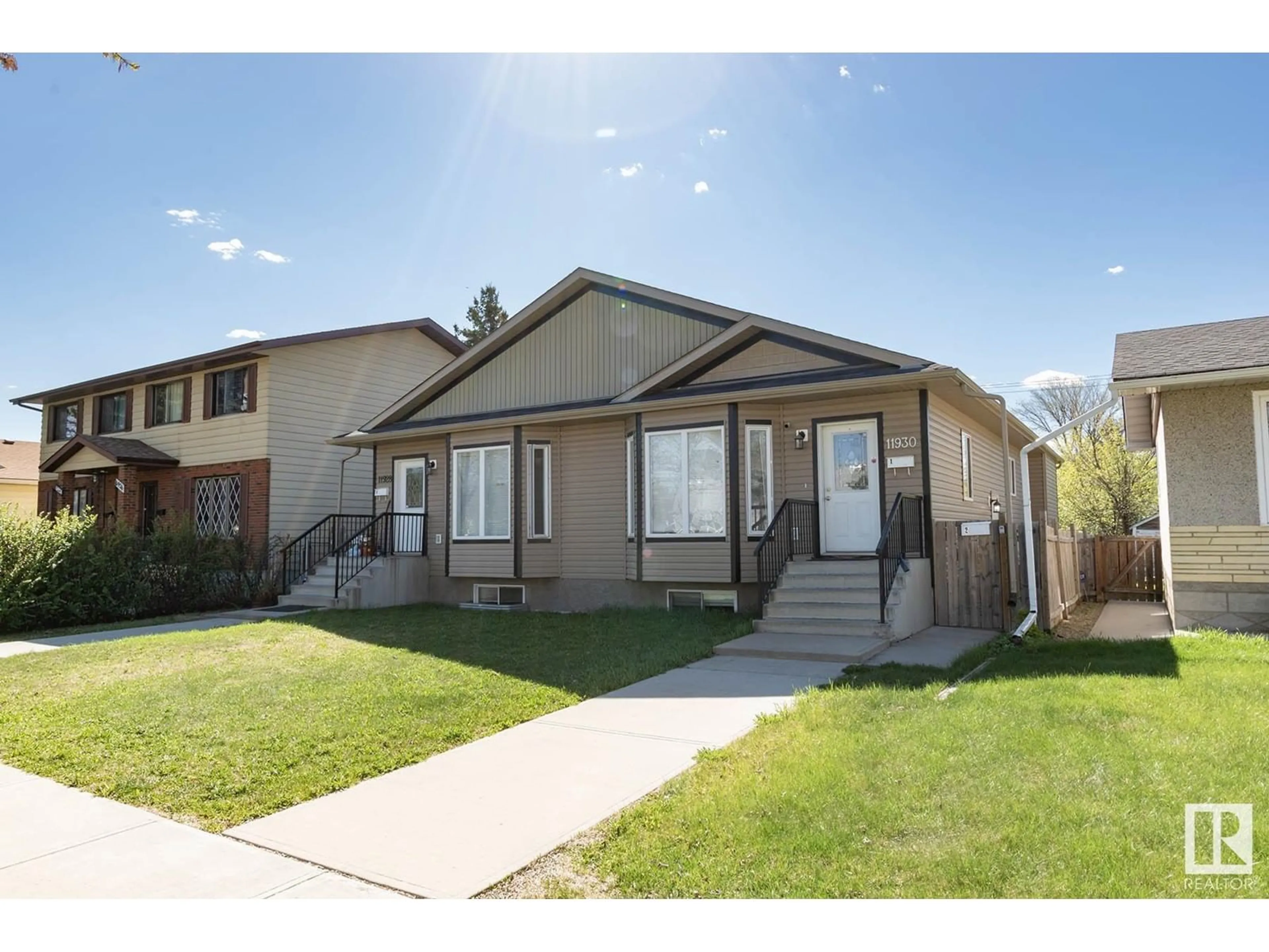 Home with vinyl exterior material, street for NW - 11930 124 ST, Edmonton Alberta T5L0M5