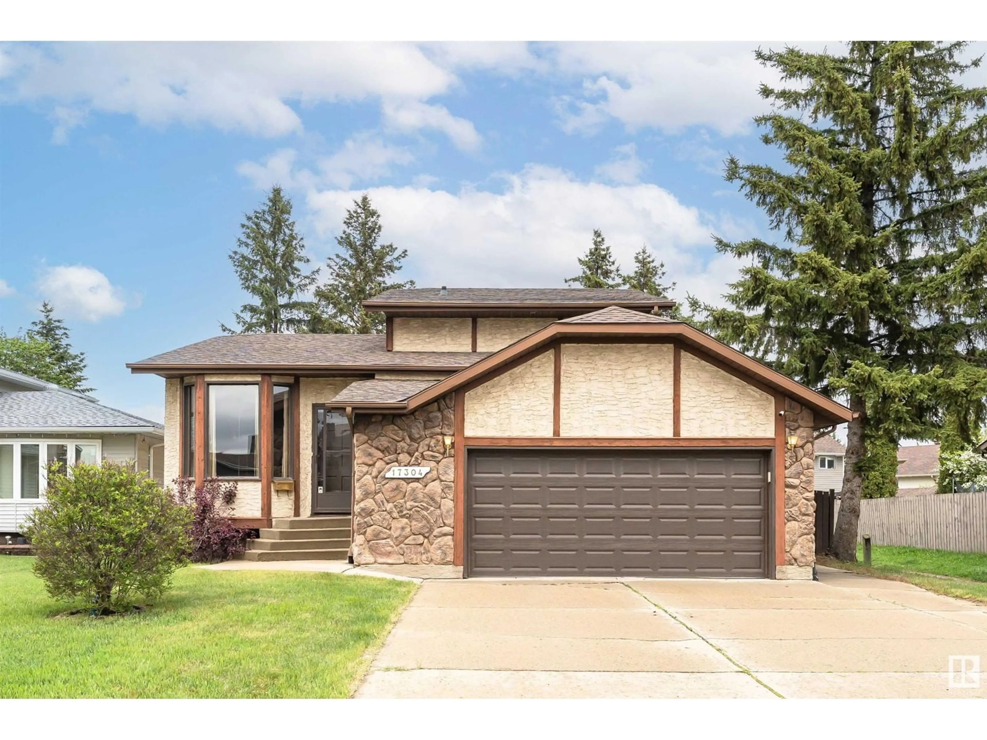 Home with brick exterior material, street for 17304 92 AV, Edmonton Alberta T5T3C2