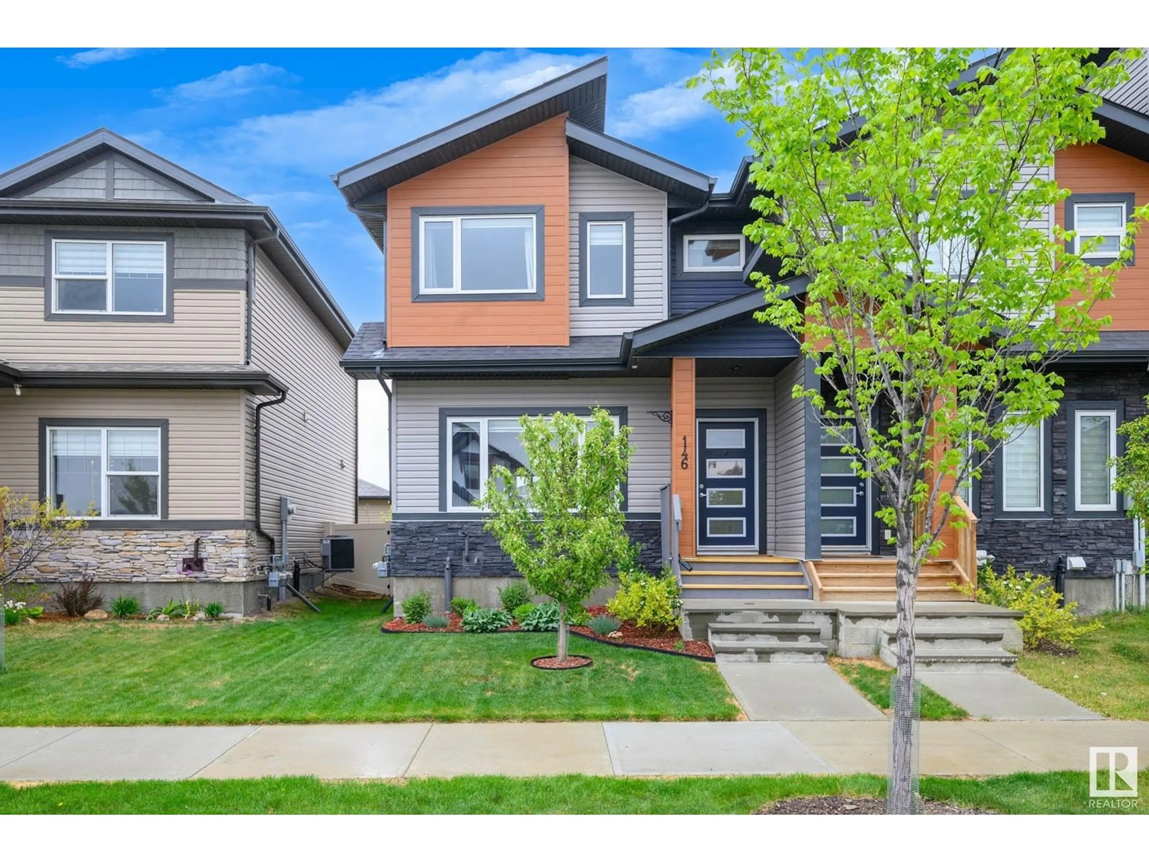 Home with vinyl exterior material, street for 146 DANSEREAU WY, Beaumont Alberta T4X2Y5