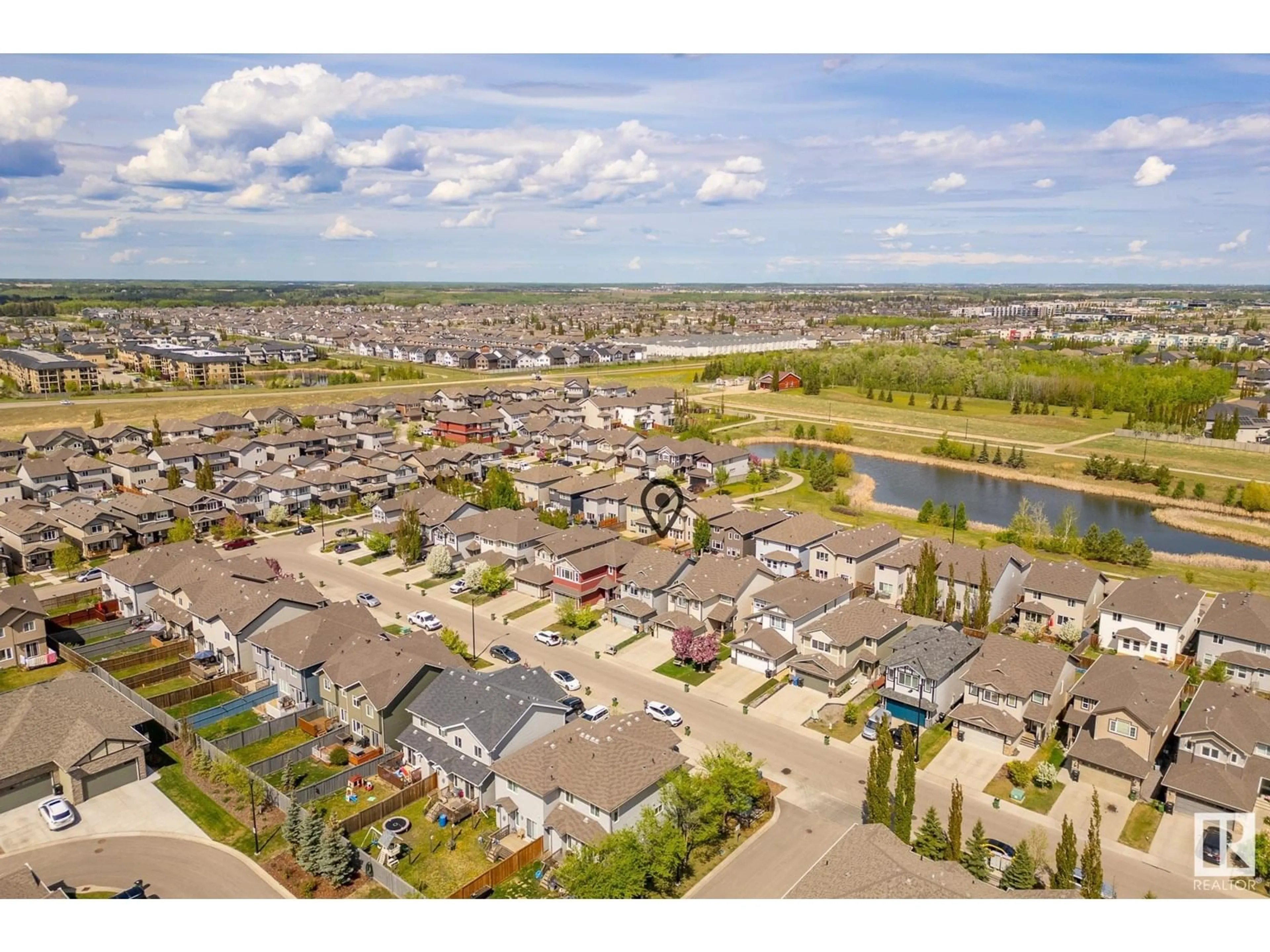 A pic from outside/outdoor area/front of a property/back of a property/a pic from drone, water/lake/river/ocean view for SW SW - 7122 ARMOUR LI, Edmonton Alberta T6W2P1