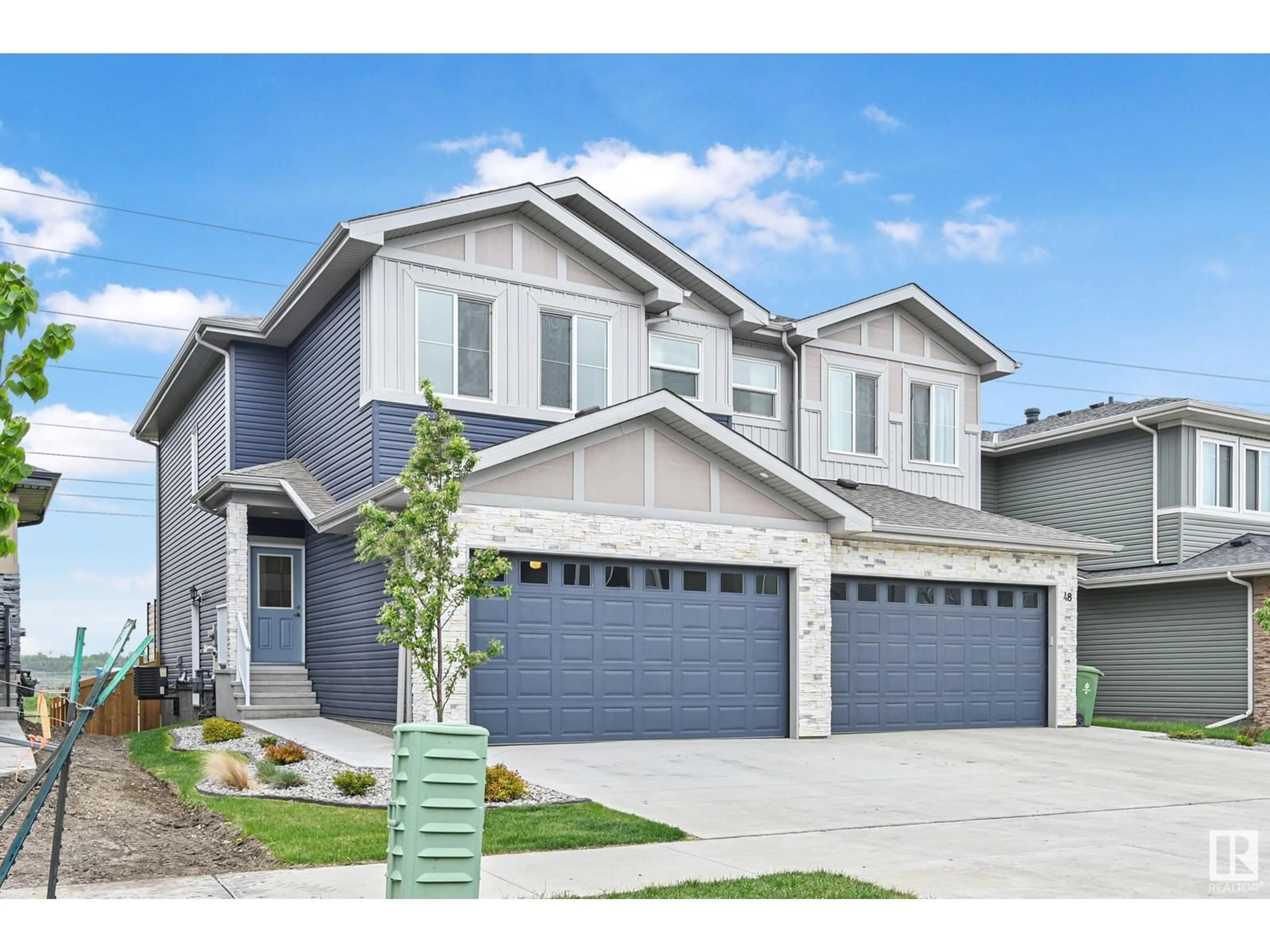 Home with vinyl exterior material, street for 46 WILTREE TC, Fort Saskatchewan Alberta T8L0X6