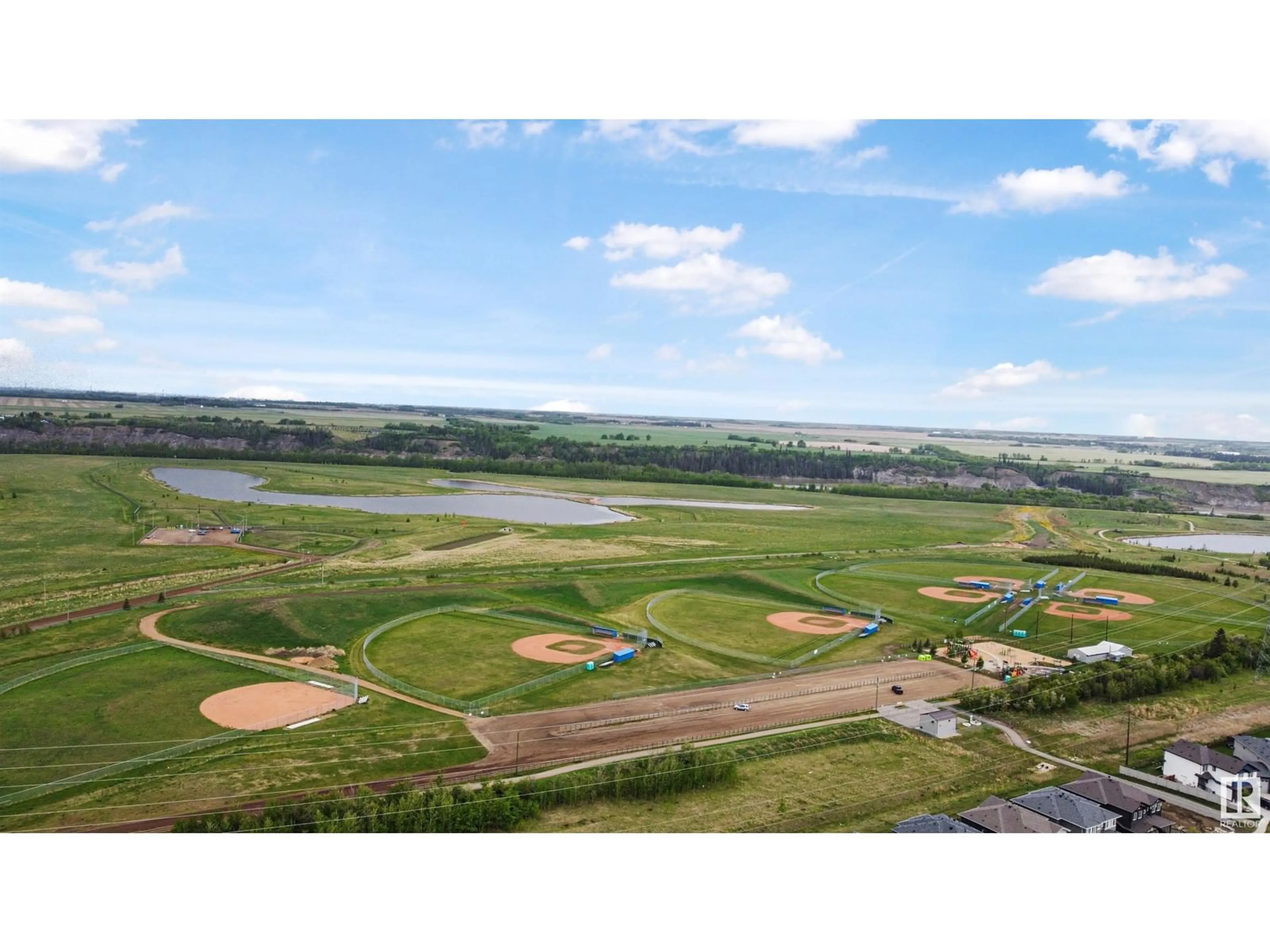 A pic from outside/outdoor area/front of a property/back of a property/a pic from drone, water/lake/river/ocean view for 46 WILTREE TC, Fort Saskatchewan Alberta T8L0X6