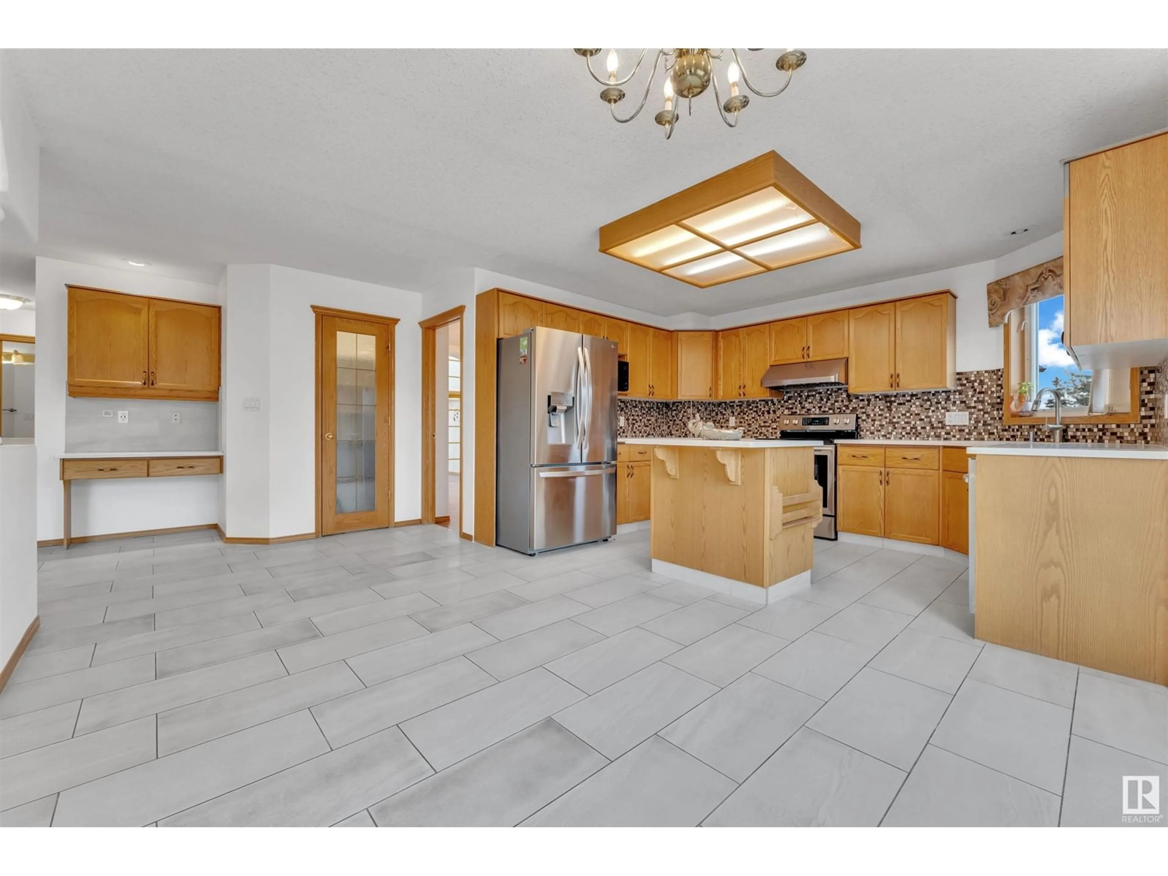 Open concept kitchen, ceramic/tile floor for 14024 128 ST NW, Edmonton Alberta T6V1K7