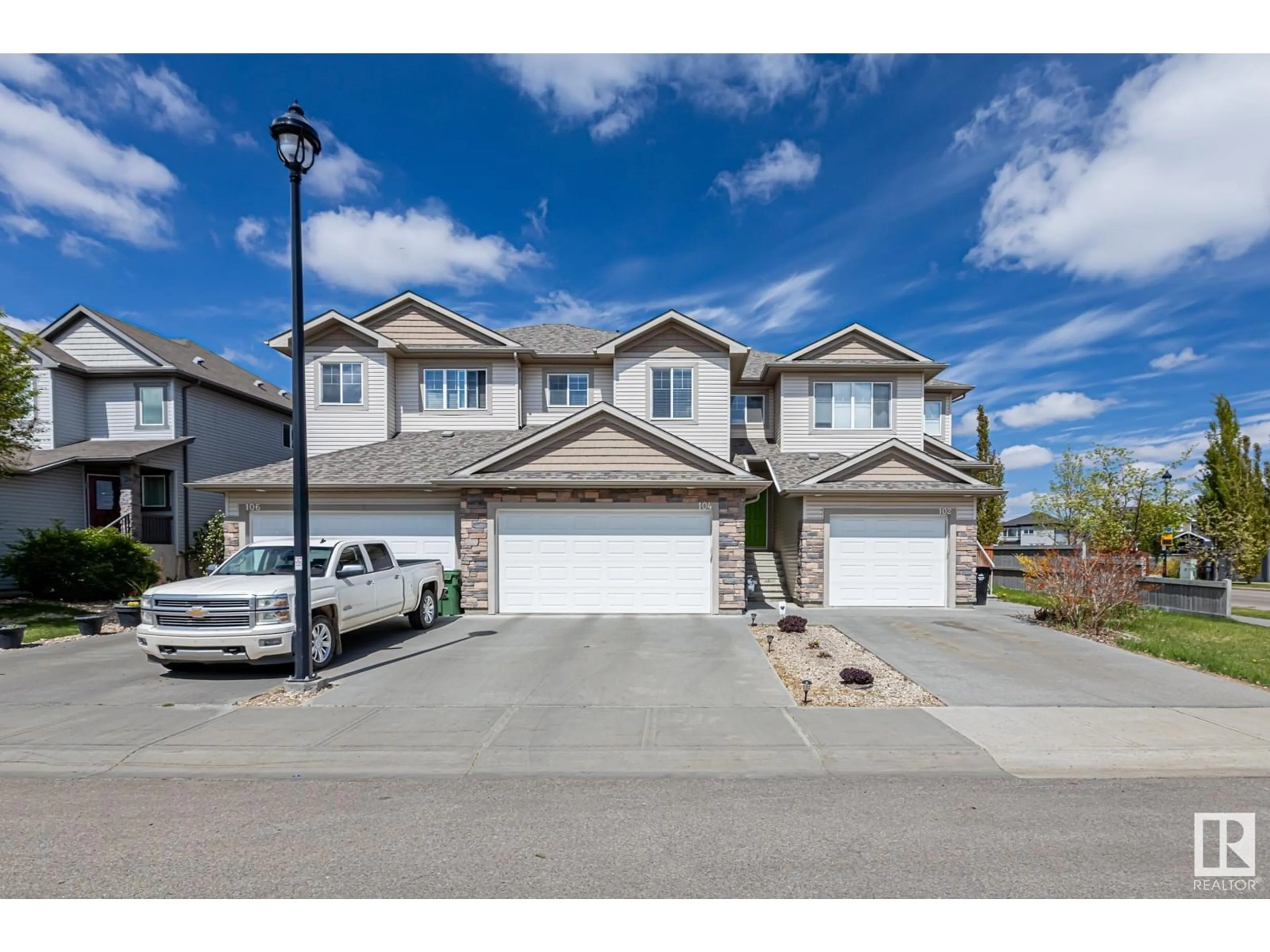 A pic from outside/outdoor area/front of a property/back of a property/a pic from drone, street for 104 KIRPATRICK LI, Leduc Alberta T9E0W2
