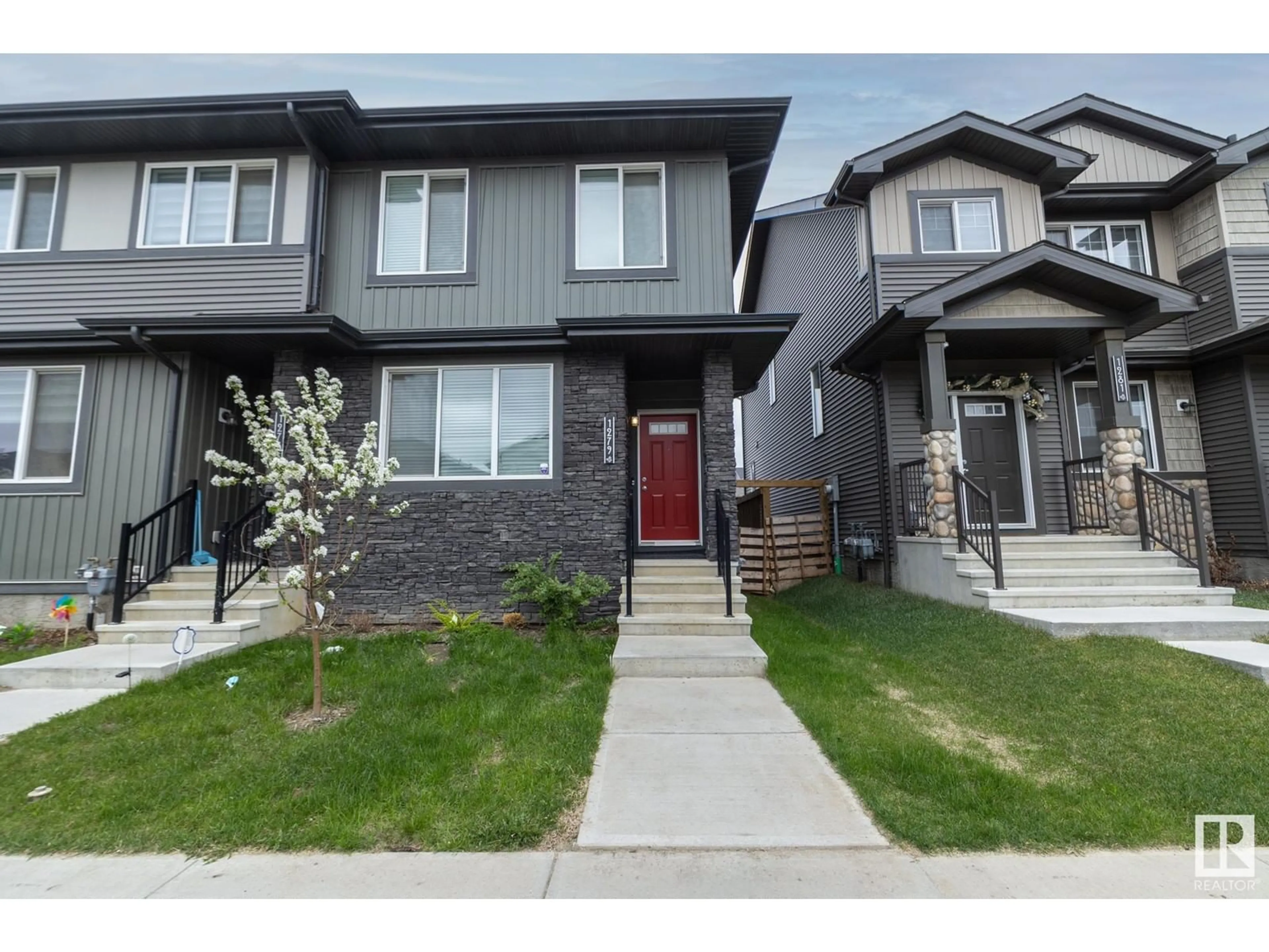 Home with vinyl exterior material, street for 1279 ROSENTHAL BV, Edmonton Alberta T5T7N7