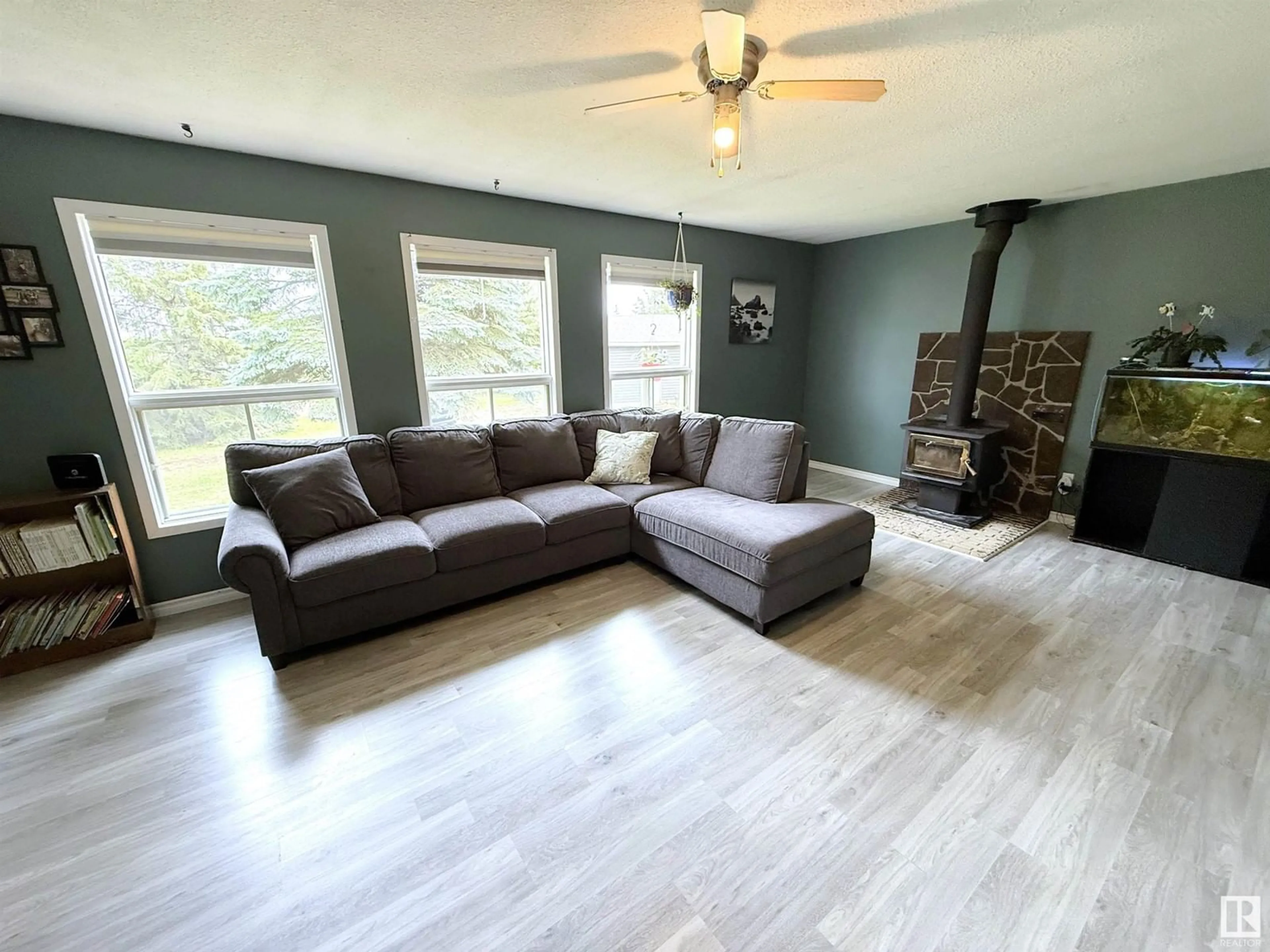 Living room with furniture, wood/laminate floor for #6 - 2311 TWP ROAD 530, Rural Parkland County Alberta T7Y3M8