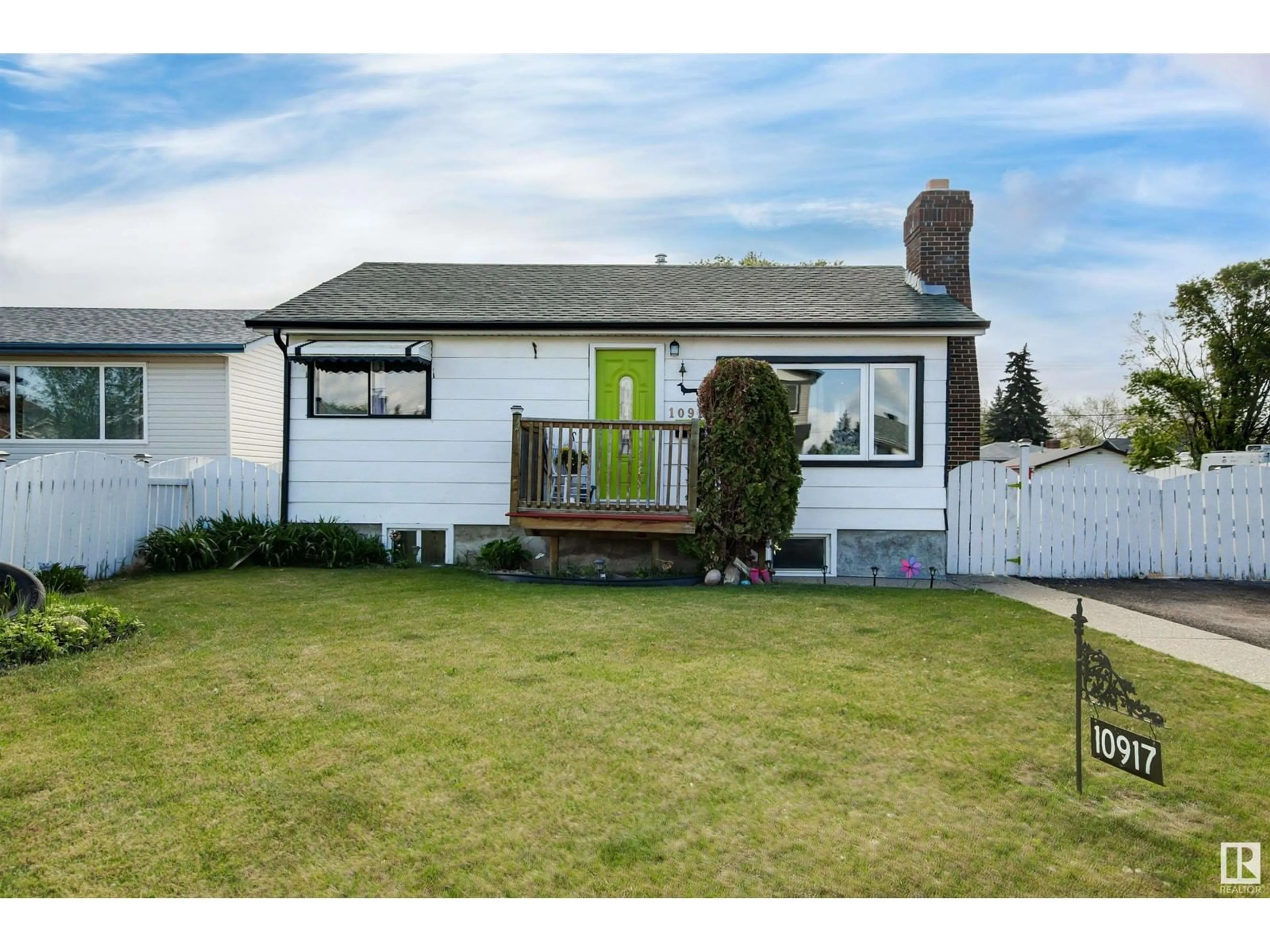Home with vinyl exterior material, street for 10917 151 ST, Edmonton Alberta T5P1R8