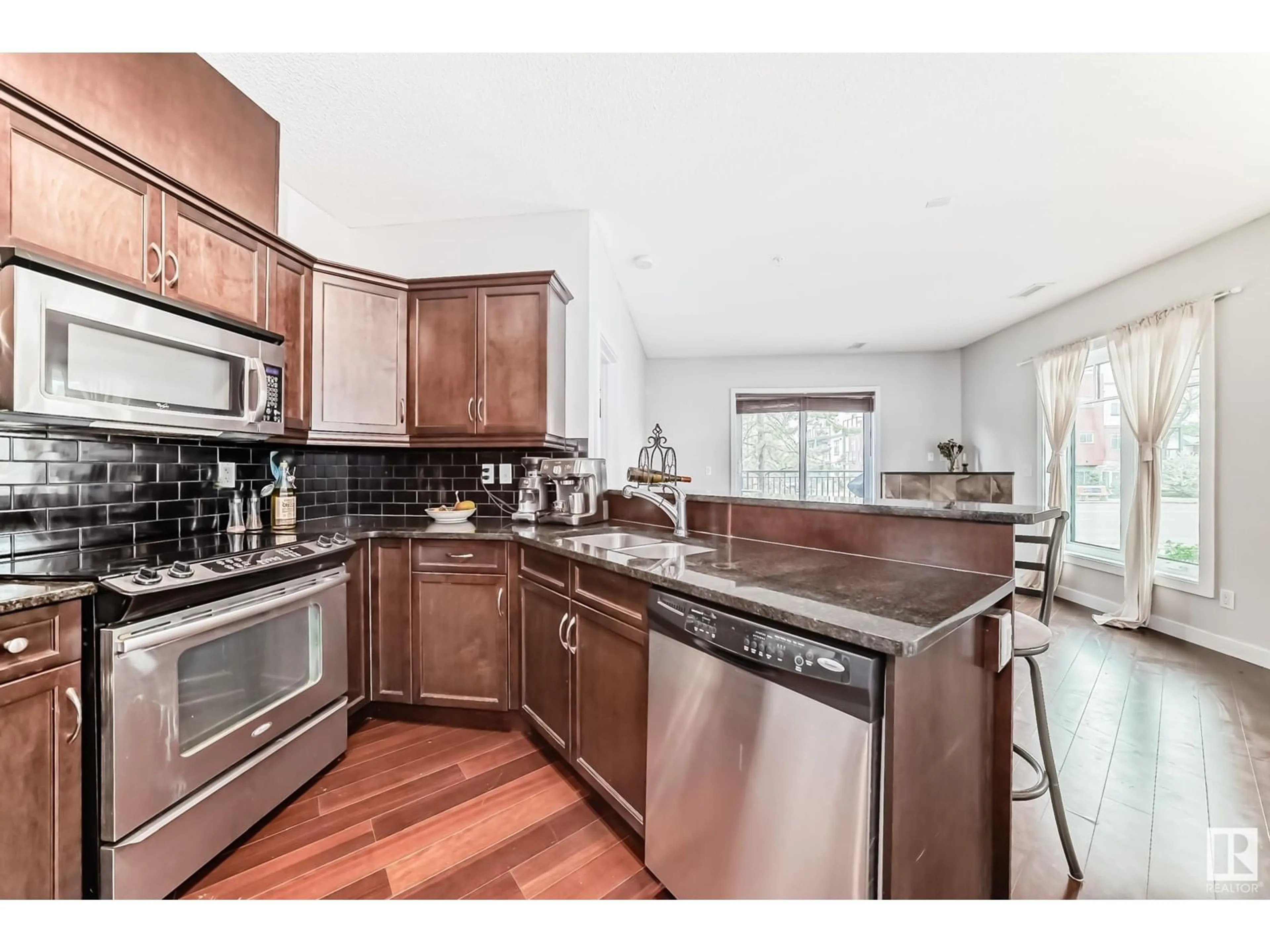Open concept kitchen, unknown for #102 - 7907 109 ST, Edmonton Alberta T6G1C7