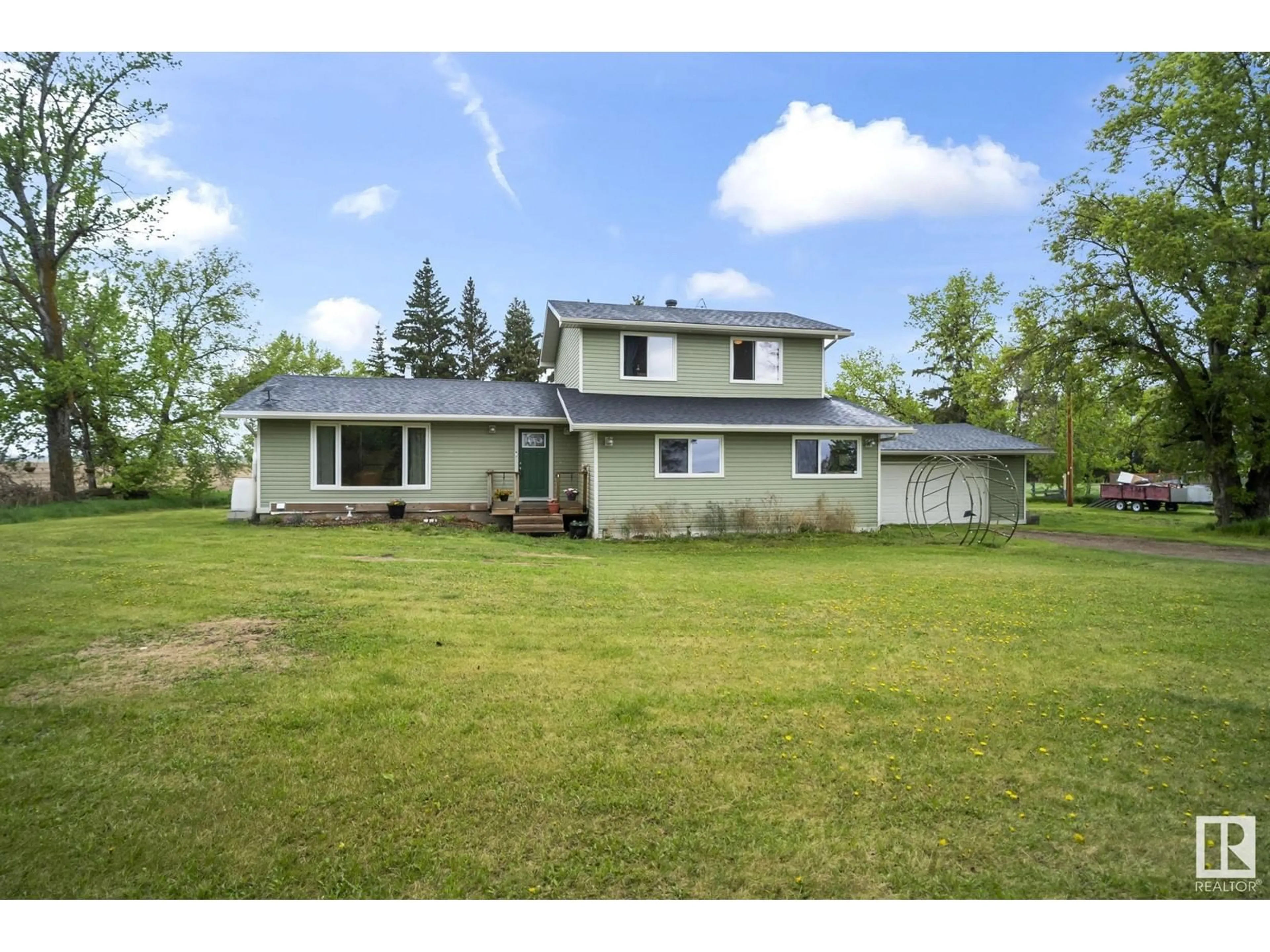 A pic from outside/outdoor area/front of a property/back of a property/a pic from drone, unknown for 58018 RR 245, Rural Sturgeon County Alberta T0G1L2