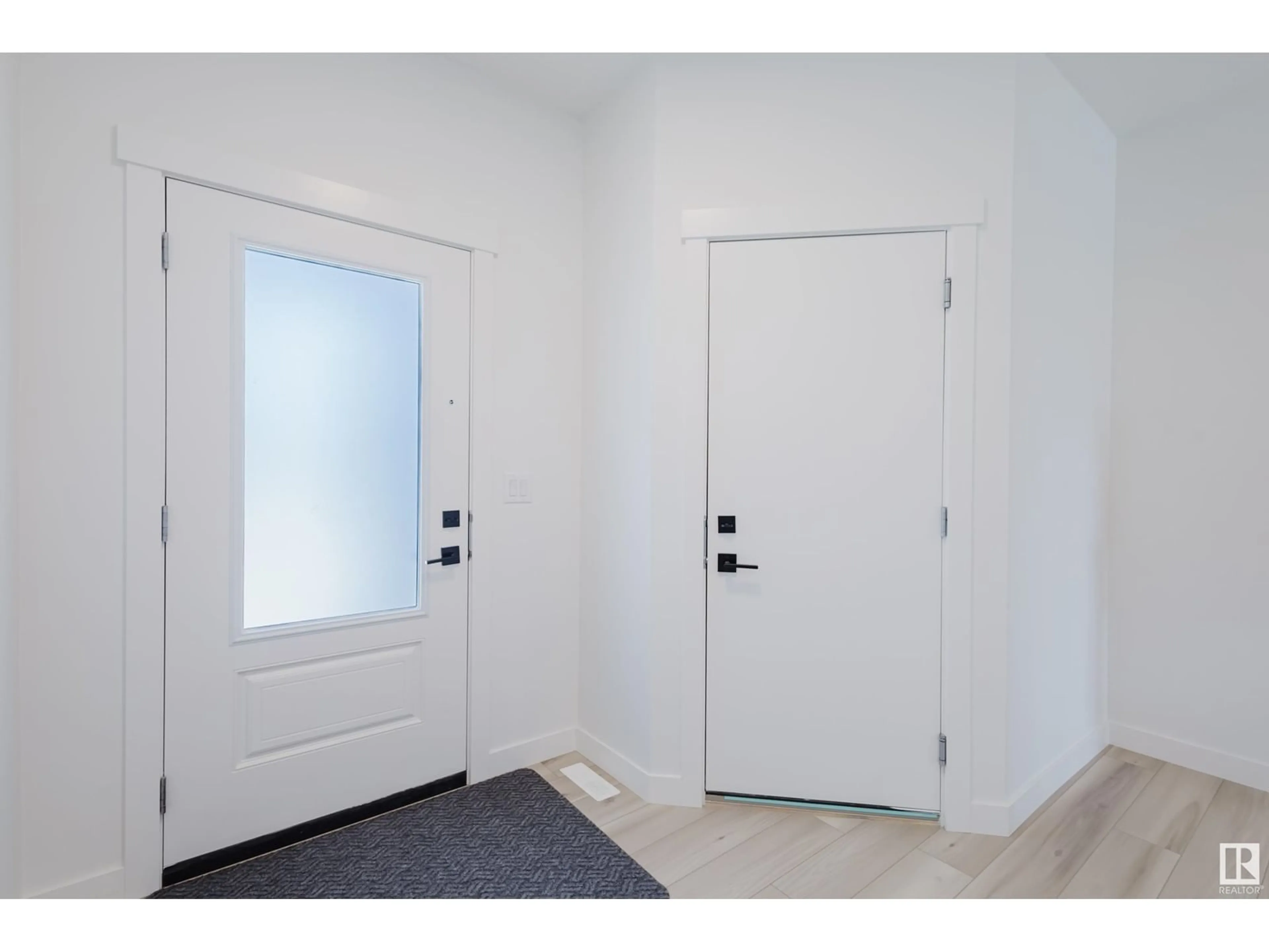 Indoor entryway for NW - 19119 22 AV, Edmonton Alberta T6M1R1
