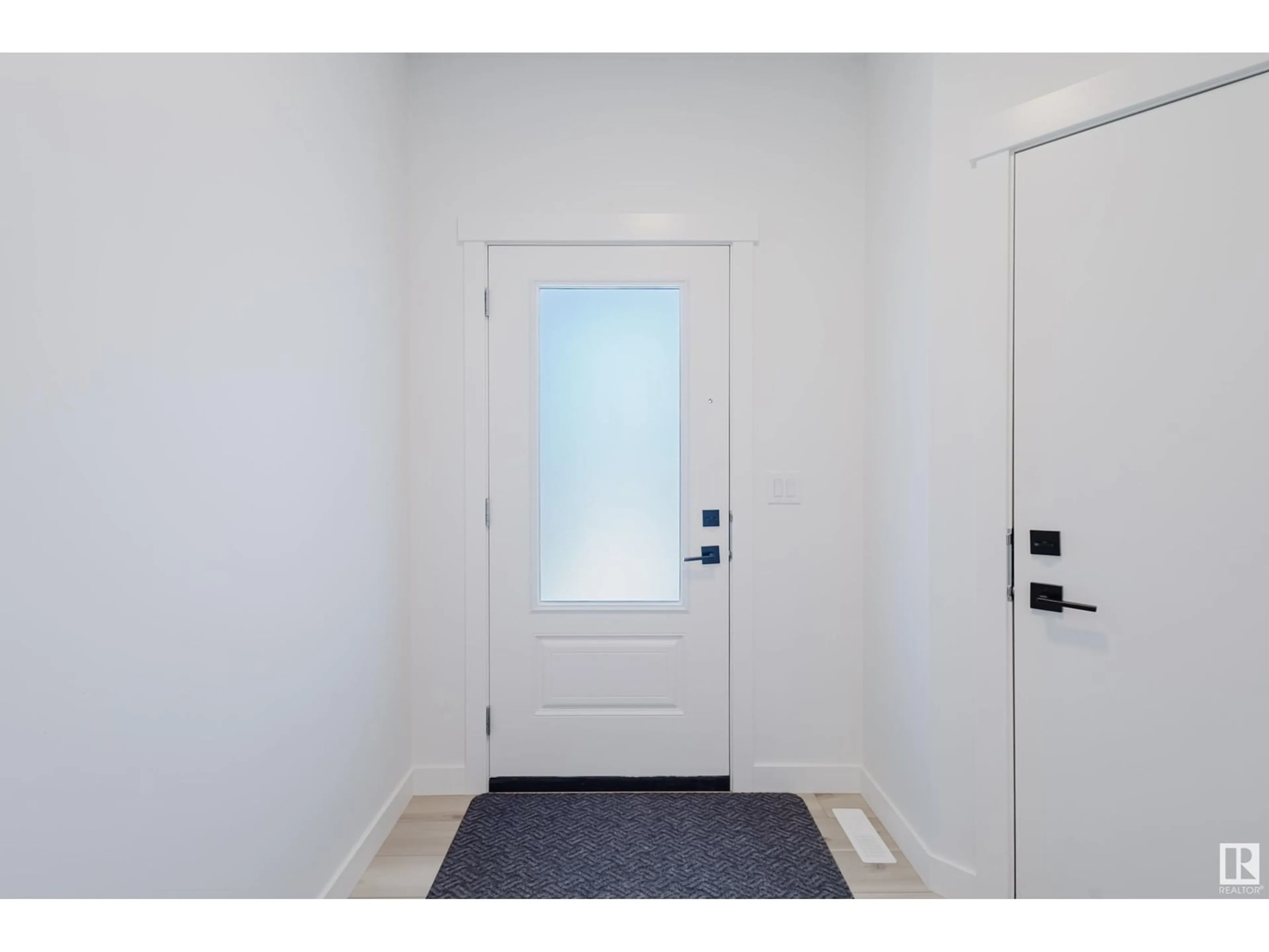 Indoor entryway for NW - 19119 22 AV, Edmonton Alberta T6M1R1