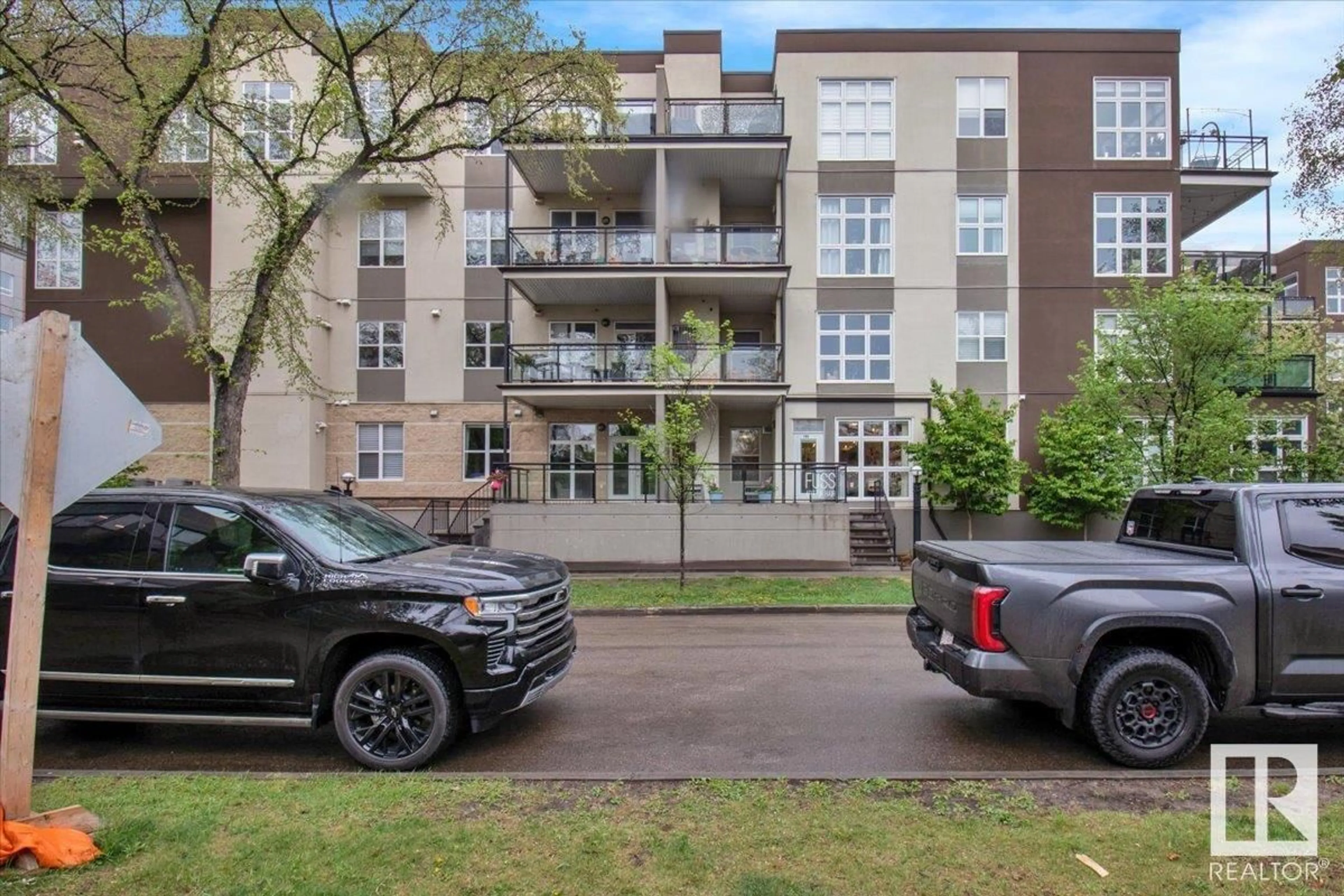 A pic from outside/outdoor area/front of a property/back of a property/a pic from drone, street for #212 - 10411 122 ST, Edmonton Alberta T5N4C2
